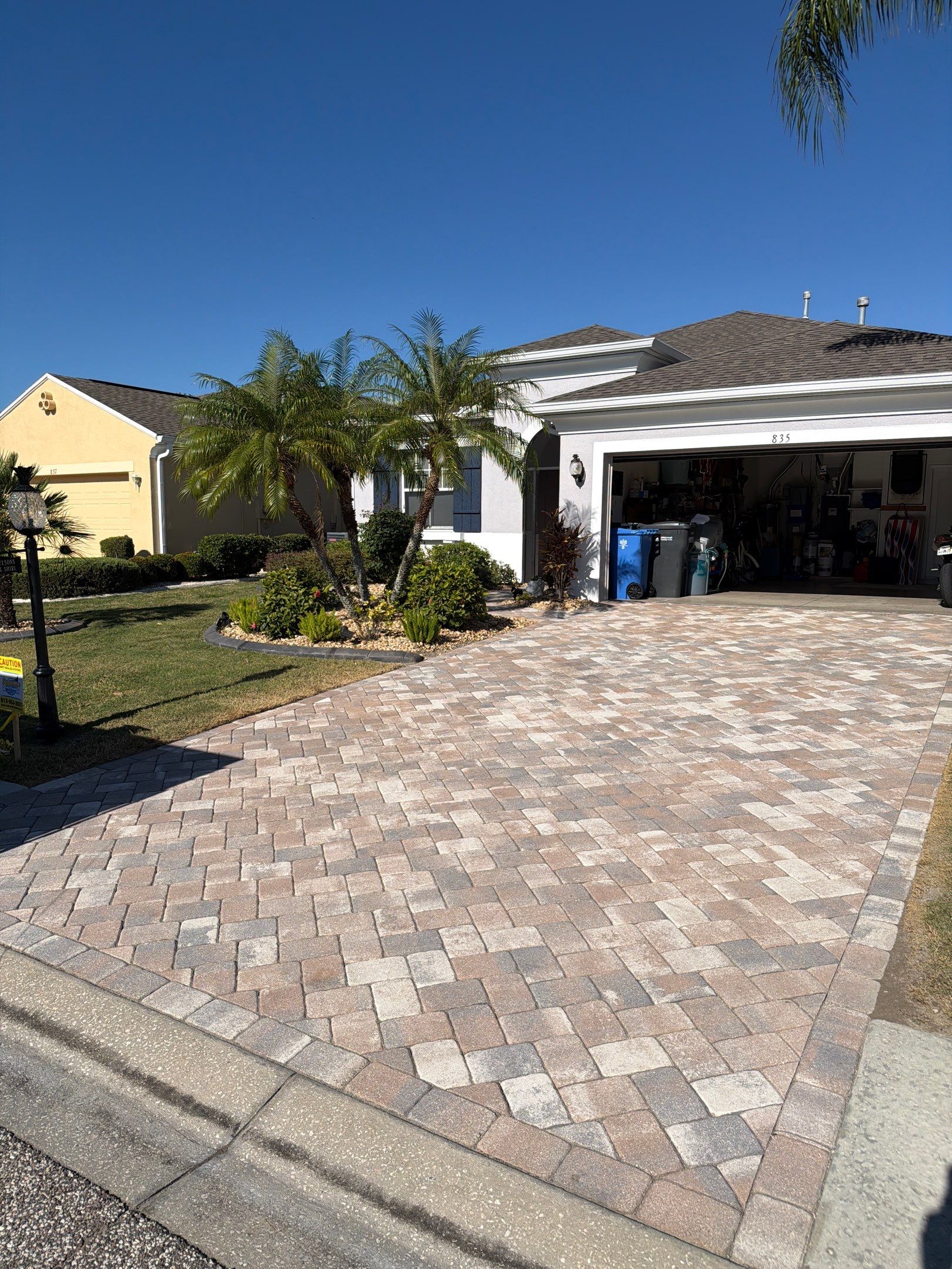 Herringbone Paver Driveway Repair, Stripping and Sealing in Sun City Center by Supreme Paver Experts