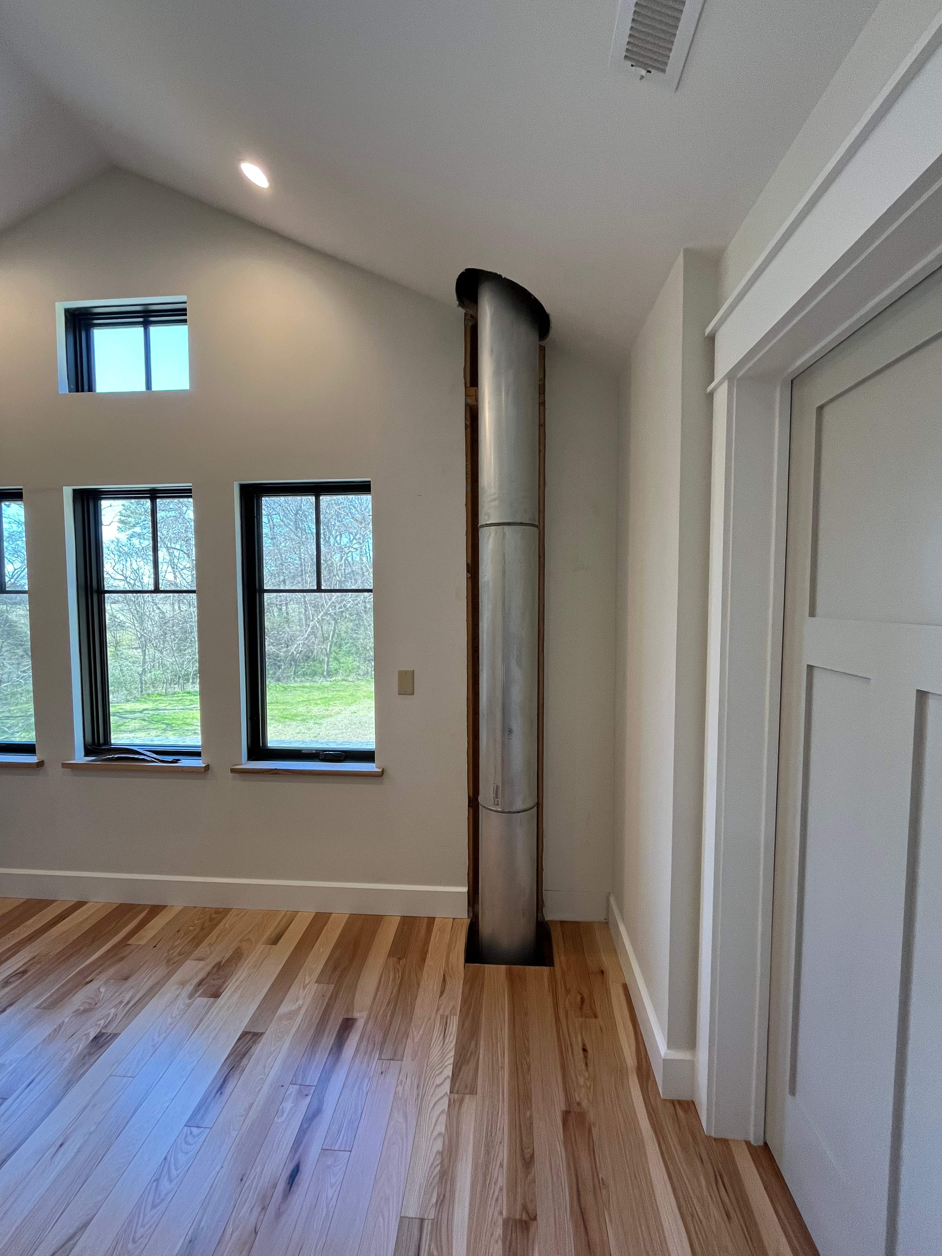 Rare Wood Fireplace and Hearth Pad by Premier Chimney and Roofing