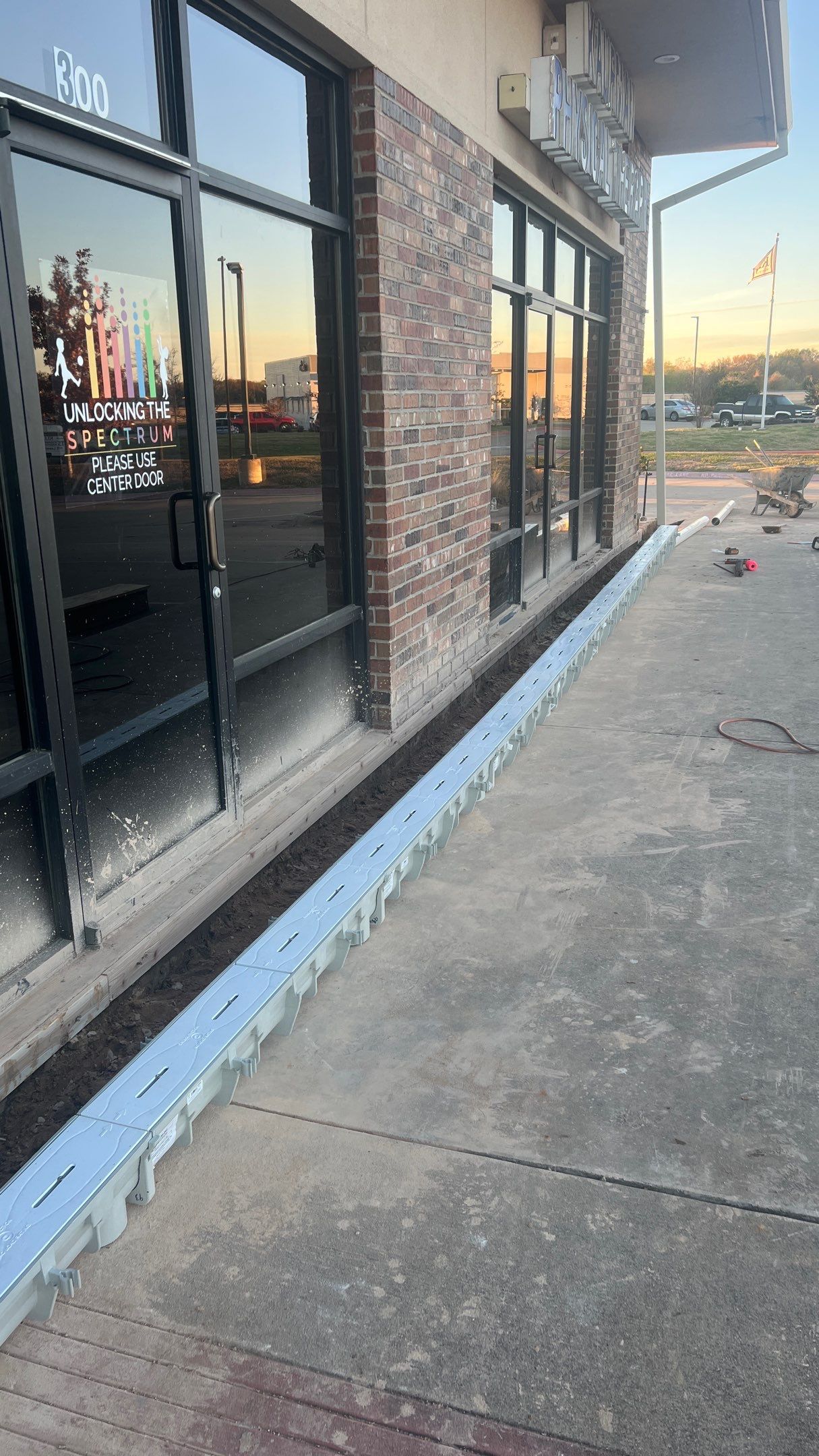 Drainage System Installation and Metal Roof Repairs by Harvey Roofing & Construction