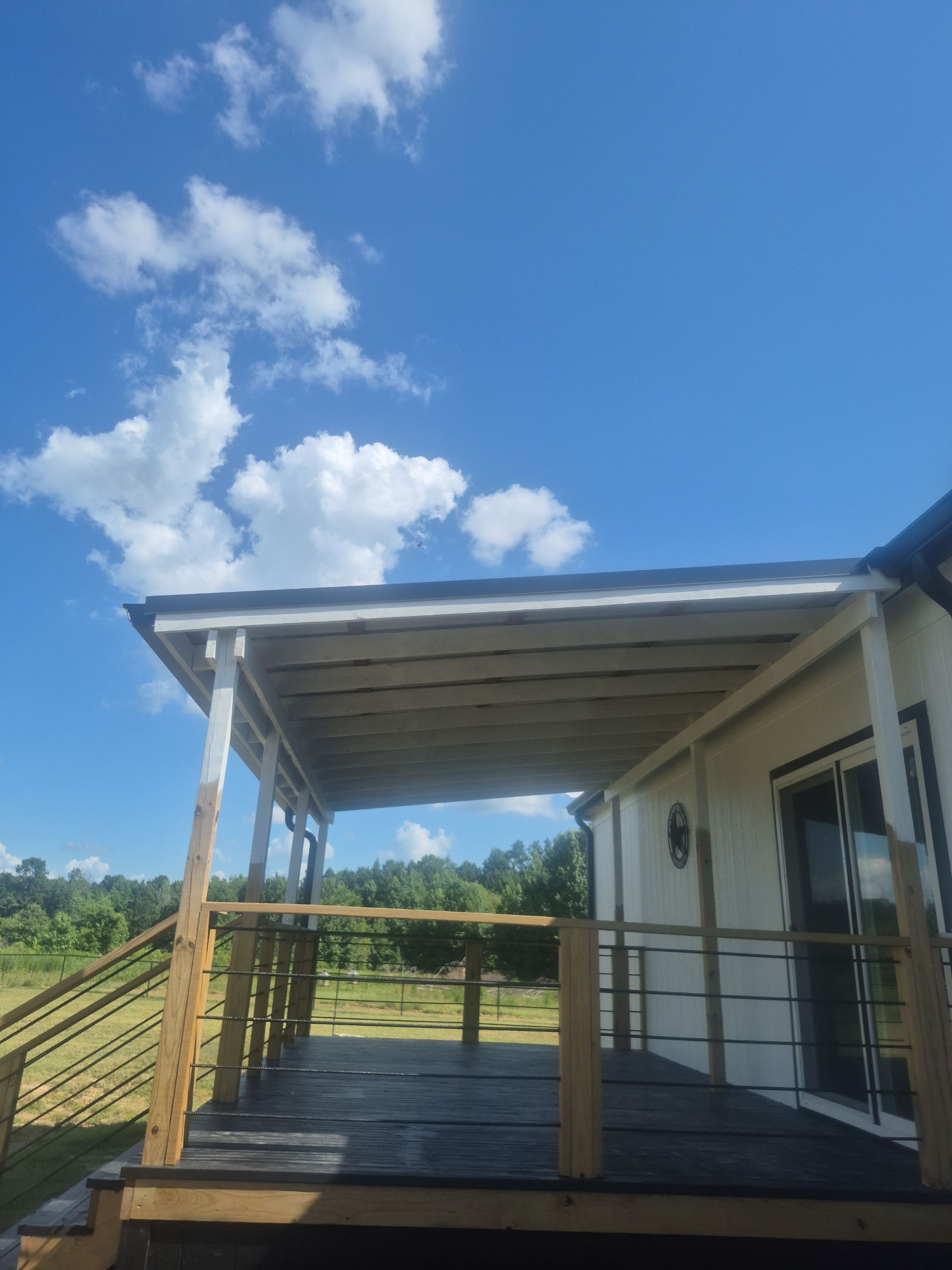 A Modern Makeover for Three Decks in Tyler TX by Quality Coats Painting