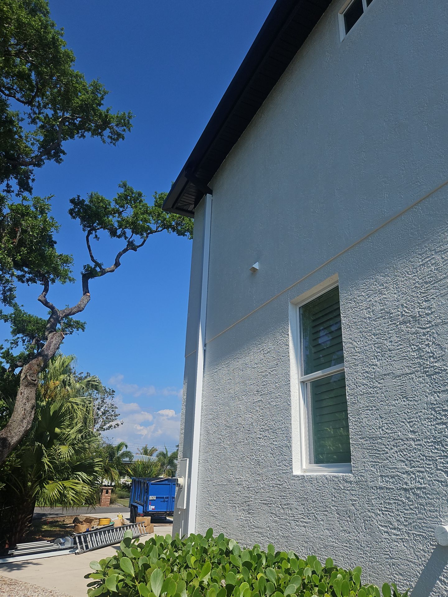 Soffit and Fascia Installation and black seamless gutters in Sarasota FL by Gutter Professors