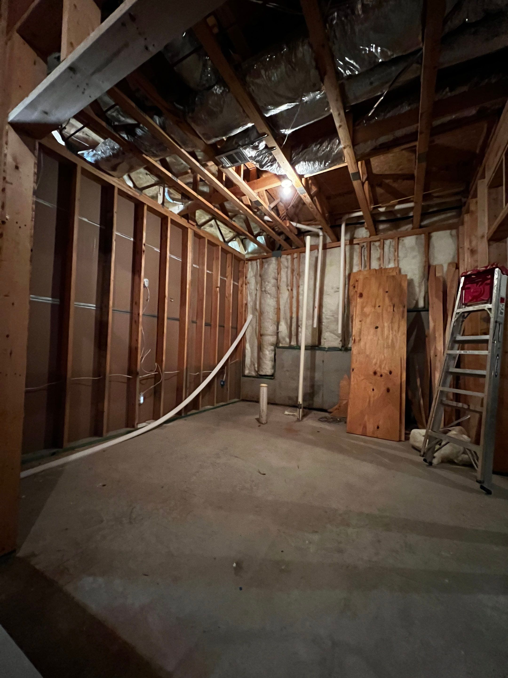 Finished Basement Renovation Featuring Polished Concrete in Atlanta by Swift Home Renovations