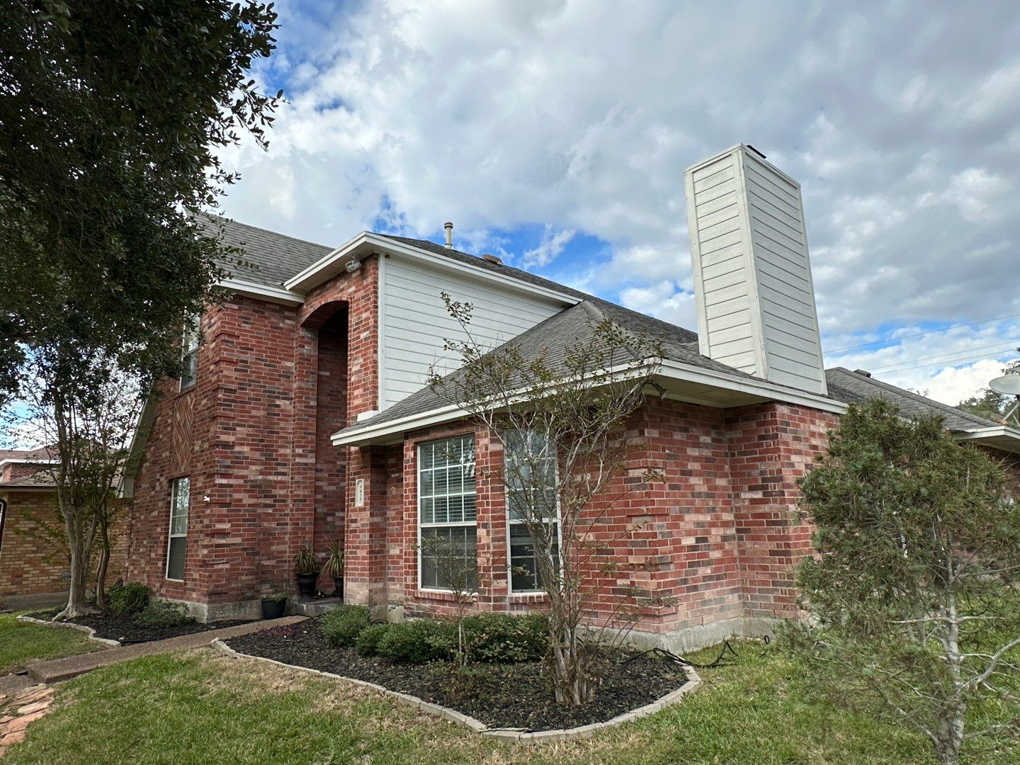 Residential Roofing Installation using Certainteed Landmark Moire Black by Galvan Roofing and Construction