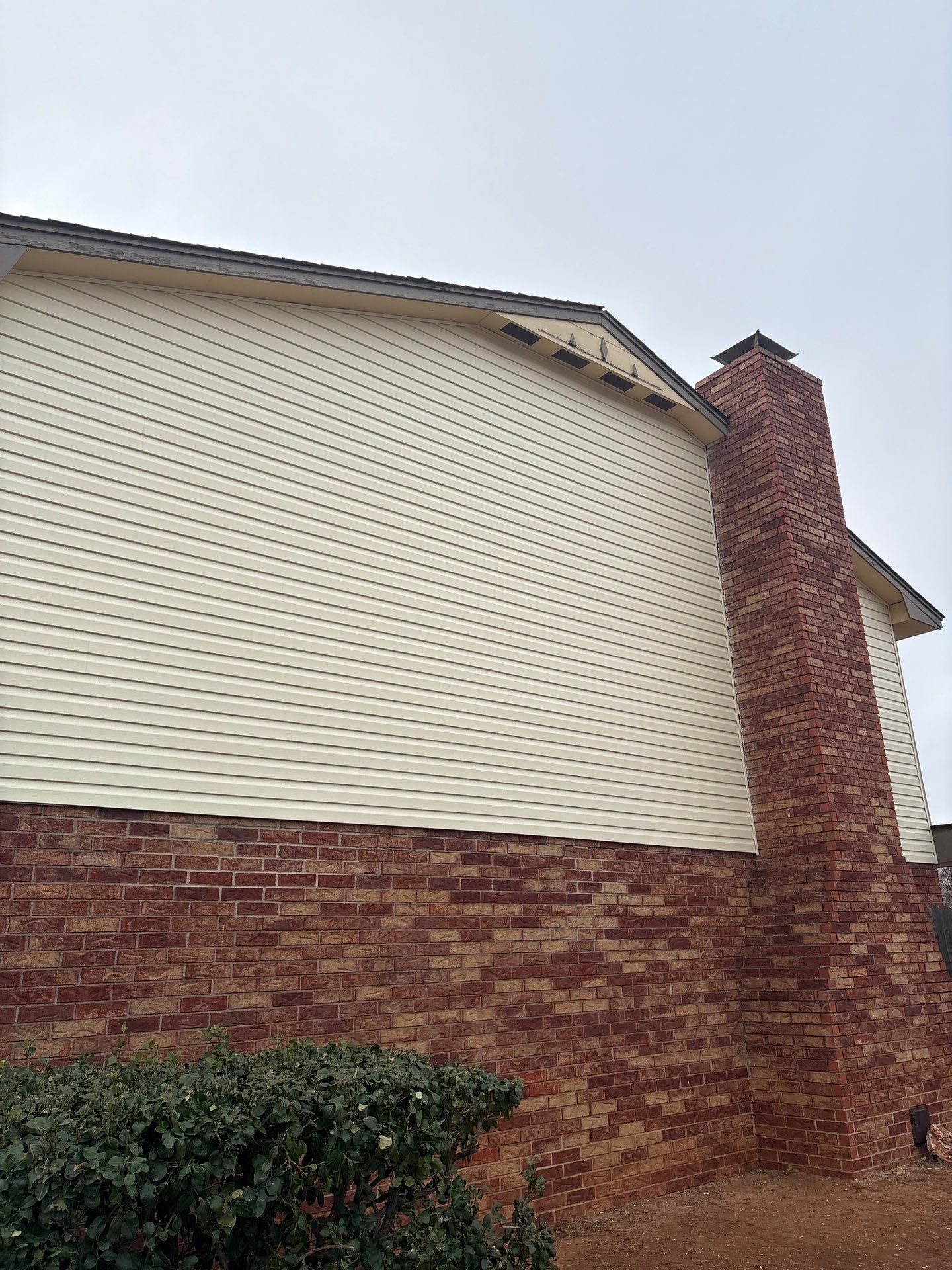 vinyl siding replacement in Warr Acres by McCann's Roofing and Construction