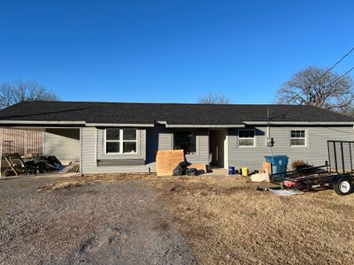 Roofing & siding replacement after hail storm damage.