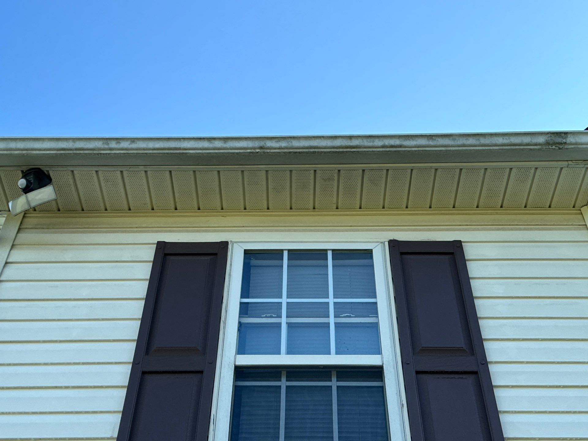 cleaning of the house siding and trim to remove dirt and mold buildup from the surfaces