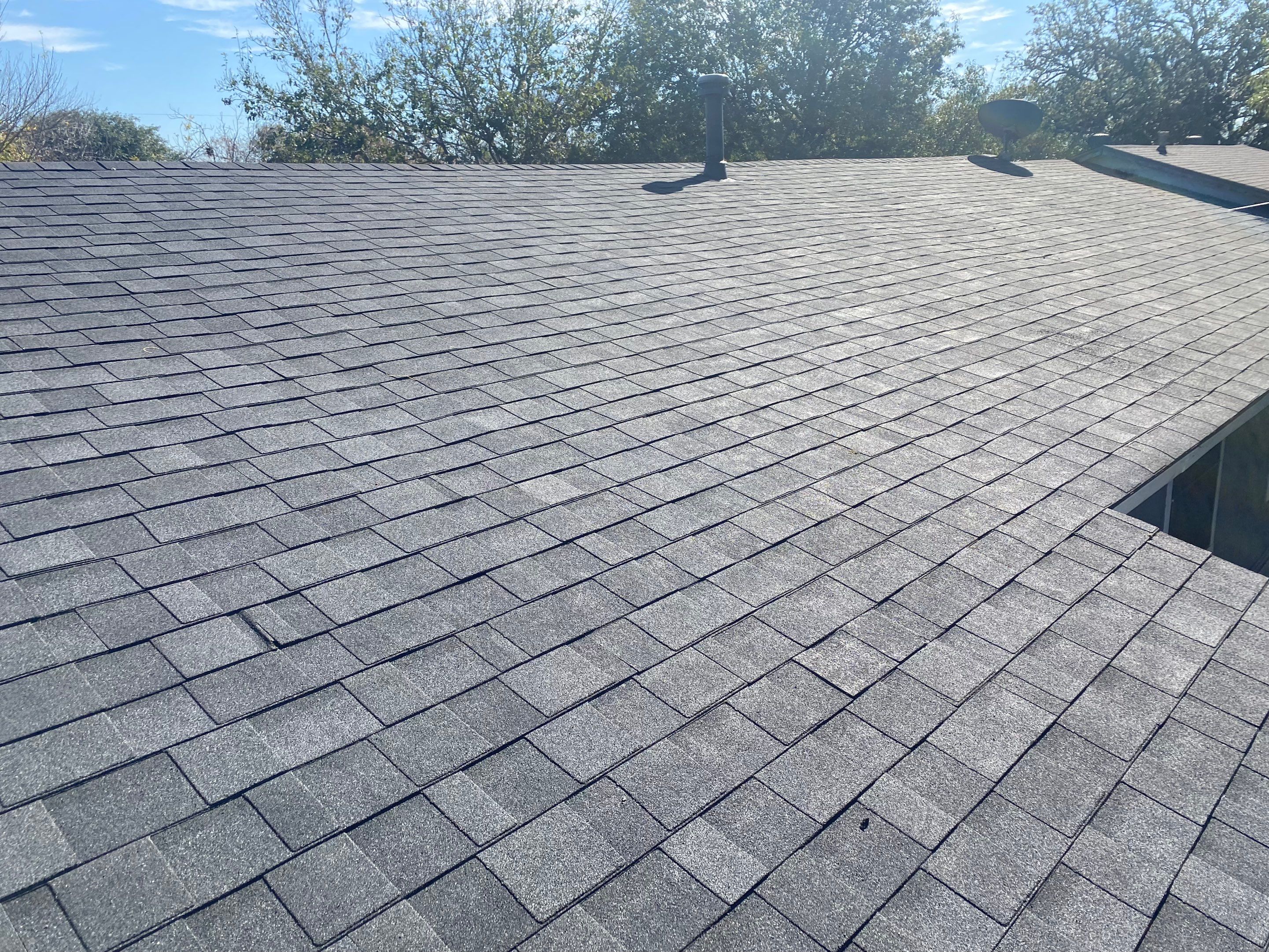 Estate Gray Shingles by Reimagine Roofing