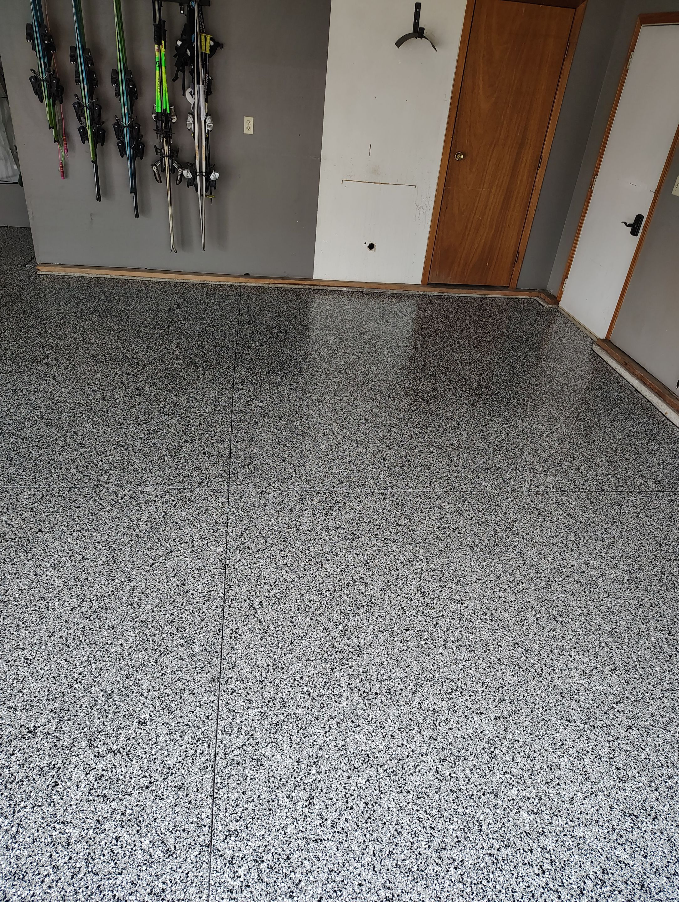 Garage Floor Concrete Coating and Crack Repair in Sioux Falls by Select Painting, Coatings & Garage Cabinets