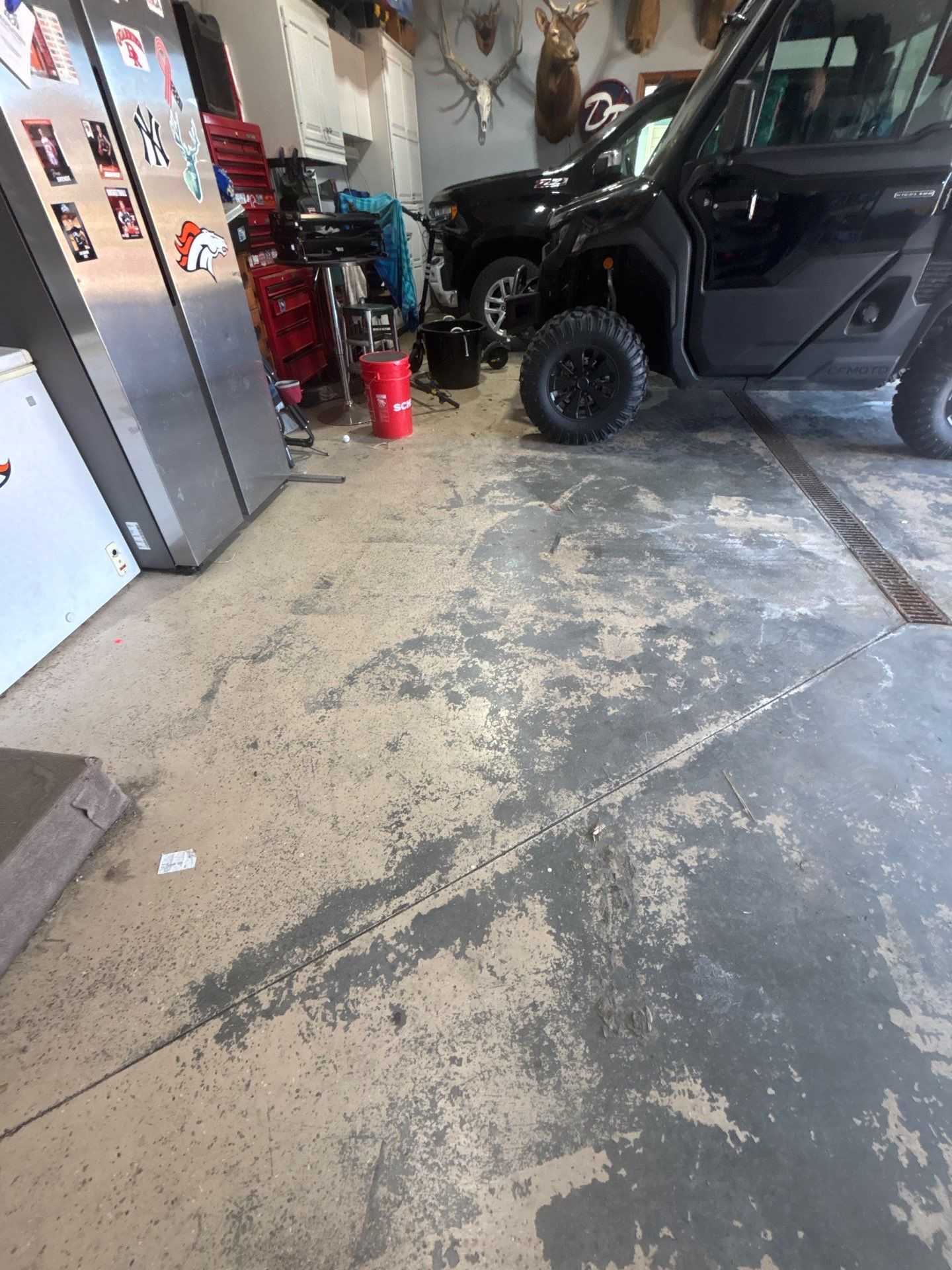 Full Garage Floor Epoxy Coating Installation in Dell Rapids by Select Painting, Coatings & Garage Cabinets