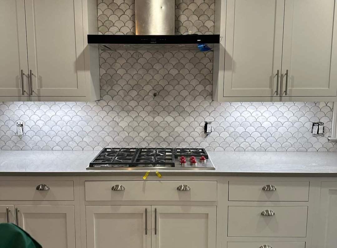 Scallop Backsplash by Footprints Floors Morristown