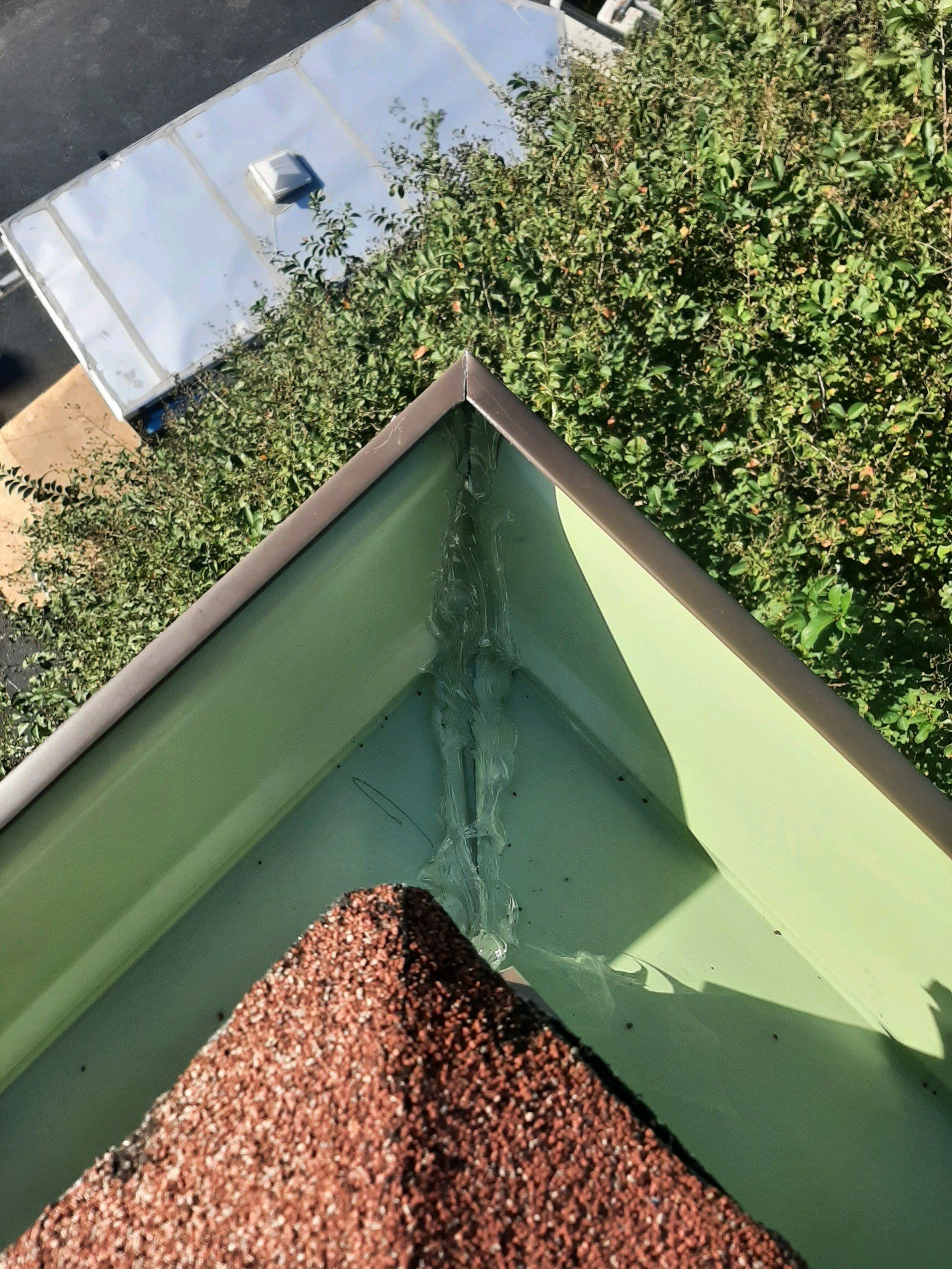 Pensacola Realtor Association Gutter Installation using K-Style White Gutters by Gutter Professors