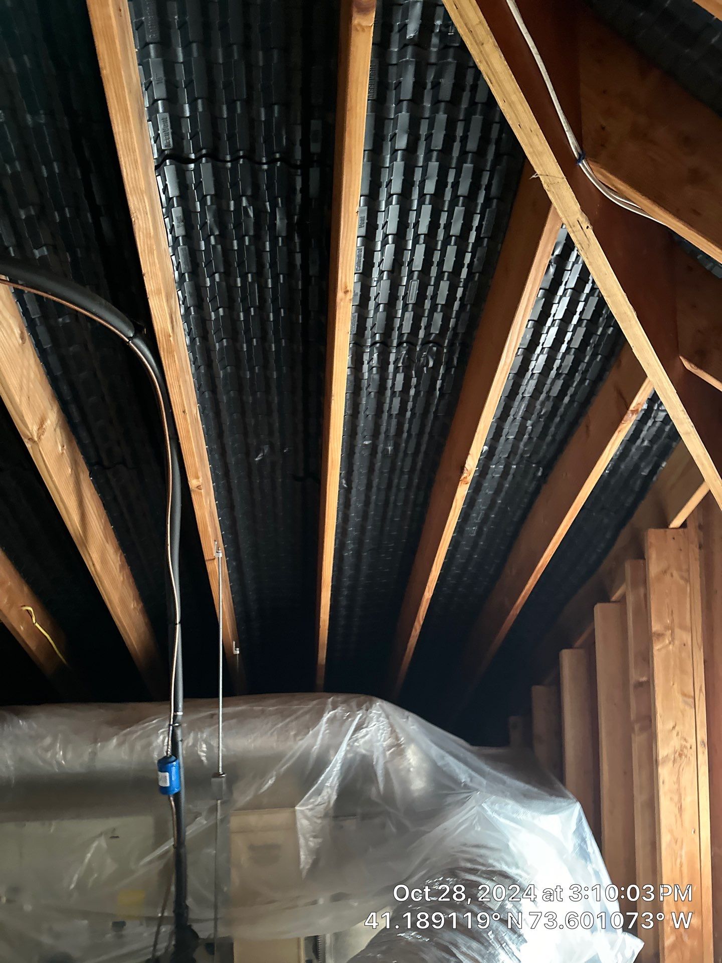 Attic Insulation using open cell spray foam by NYS Foam & Energy