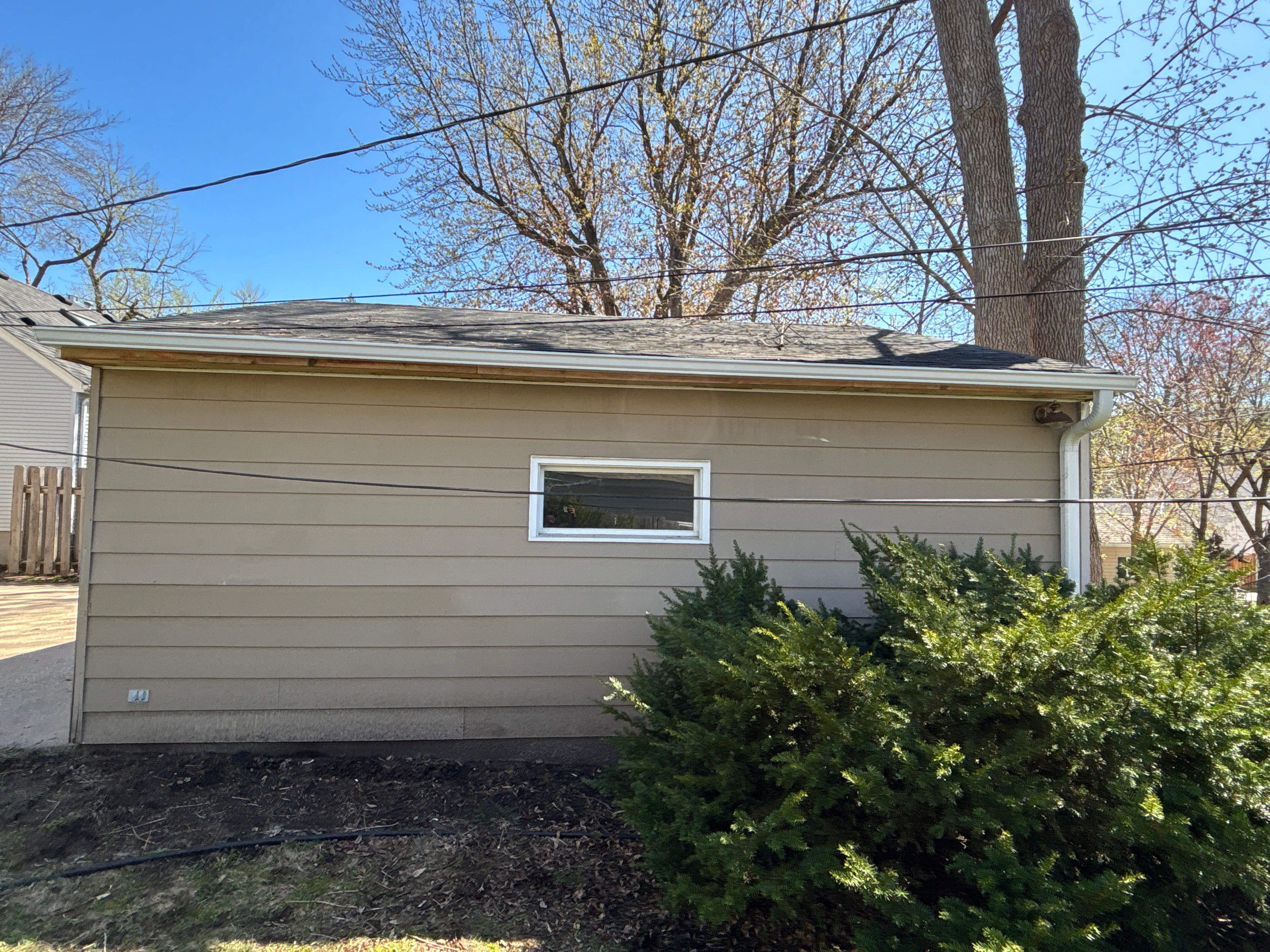 Soffit Repair + 5" Gutter Installation on Garage by Next Level Seamless Gutters / Exteriors Inc.