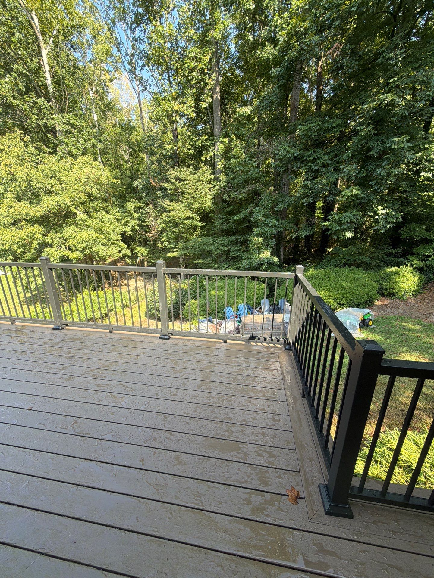 Elevated Composite Deck Replacement with Metal Railings in Smyrna by Swift Home Renovations 