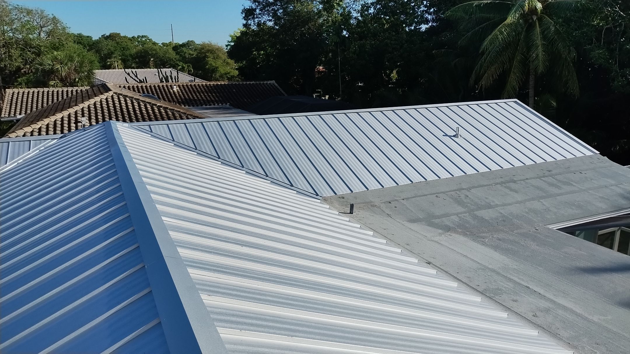 Residential Roofing Installation using 1" Nail strip metal roof by BLUES BROTHERS CONSTRUCTION CORP