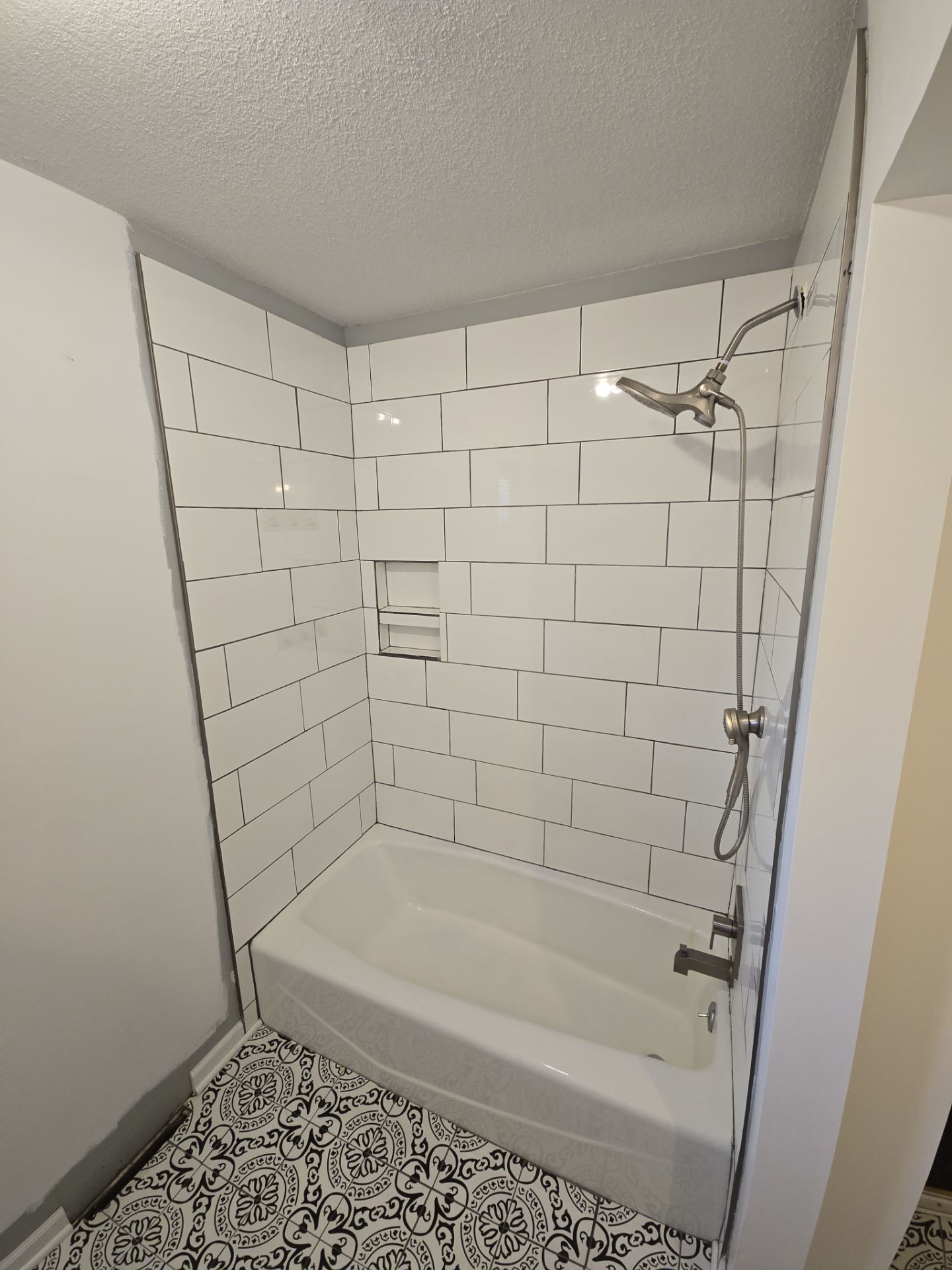 Fragmento tile bathroom floor and shower walls by The Shower Company