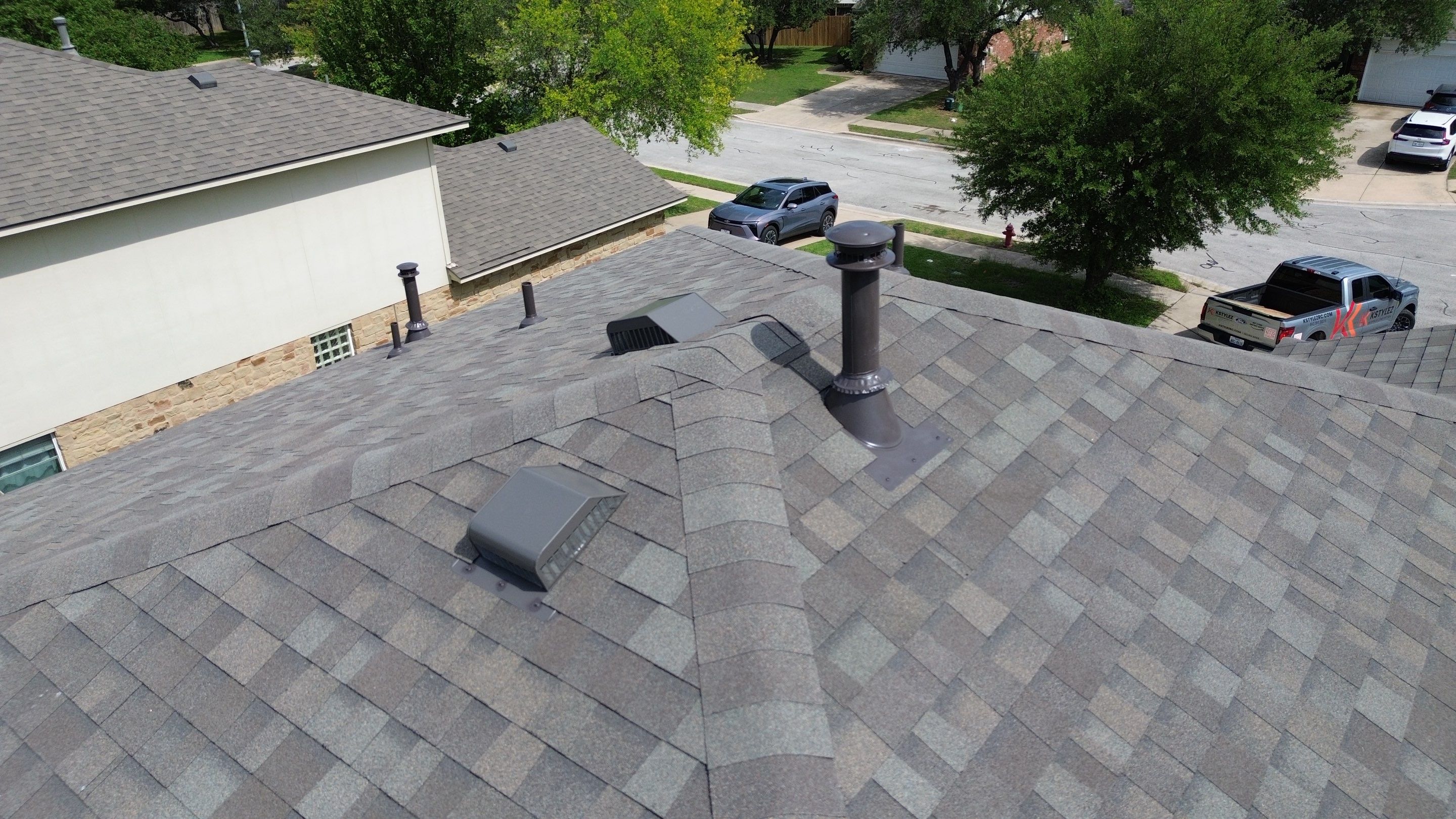 Roof Replacement in Round Rock, TX | Owens Corning Oakridge Driftwood Shingles by Kstylez Roofing & Construction