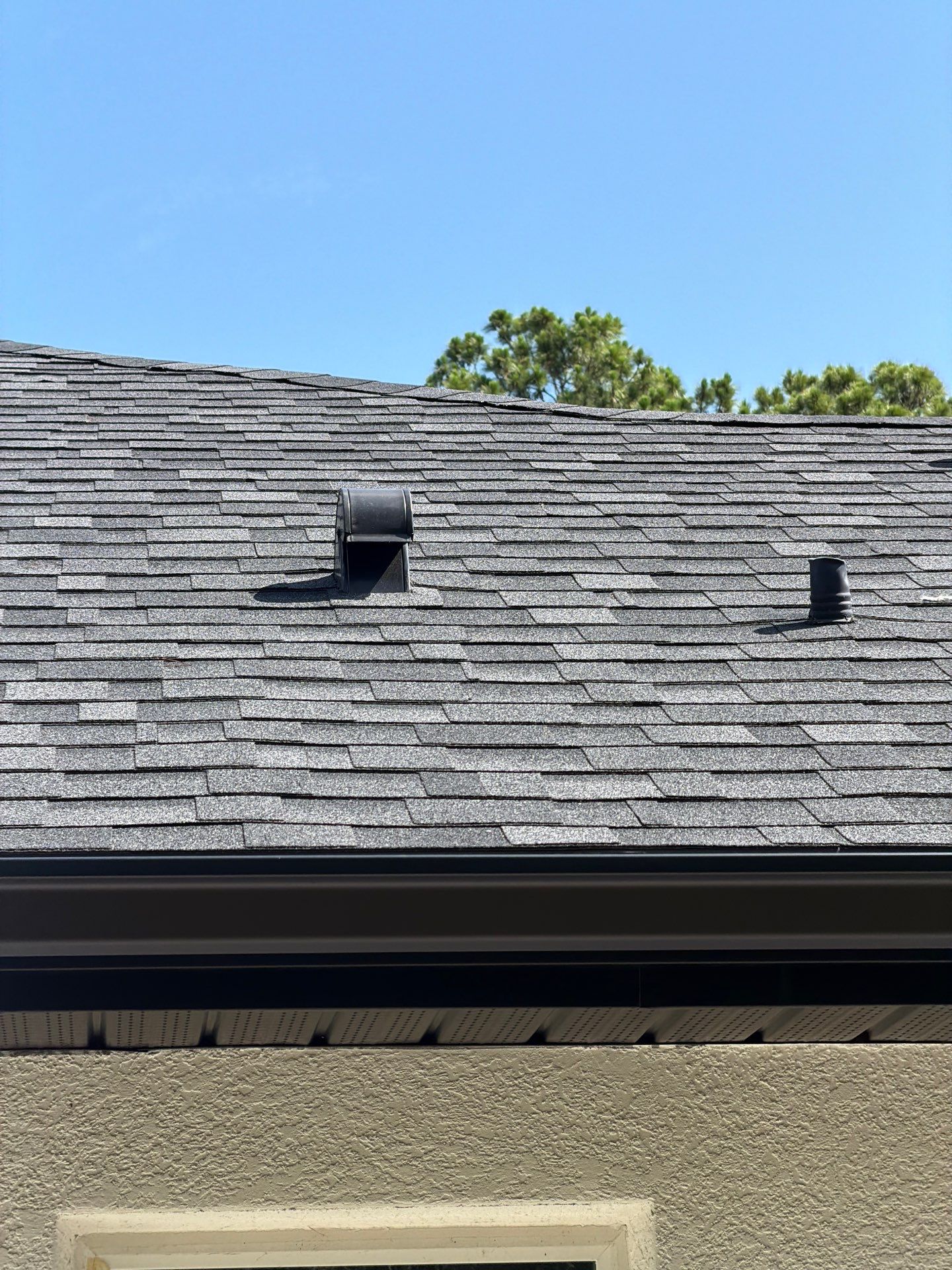GAF Asphalt Shingle Roof Replacement with Skylight in Eustis by Fortified Roofing Solutions Corp.