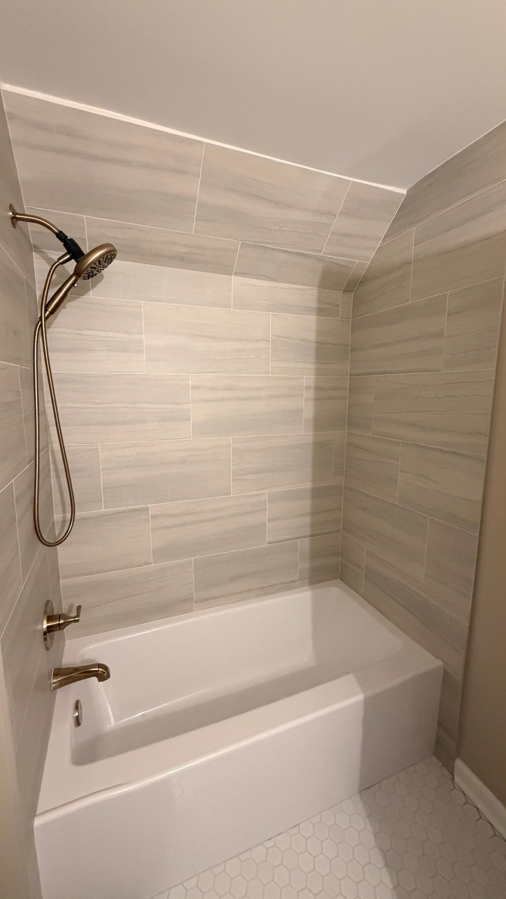 Modern Bathroom Remodel With Quartz Countertops and Hexagonal Tile in Acworth by Swift Home Renovations