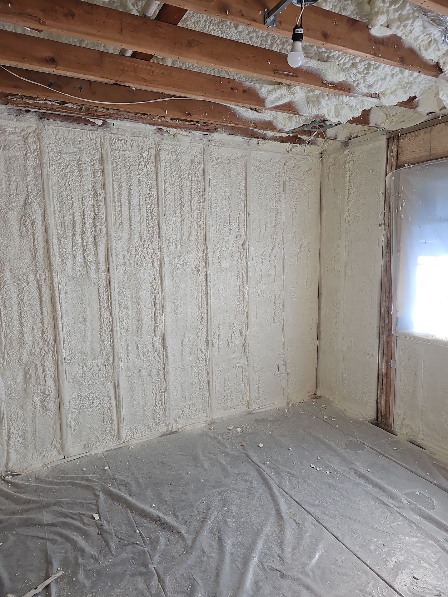 Basement Exterior Walls using Closed Cell Spray Foam by NYS Foam & Energy