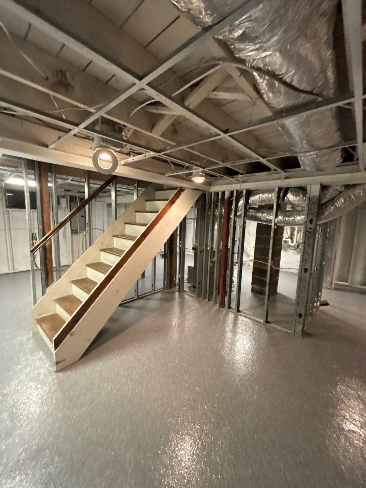 Basement Concrete Floor Coating with Penntek Flake System by Spectrum Painting, LLC