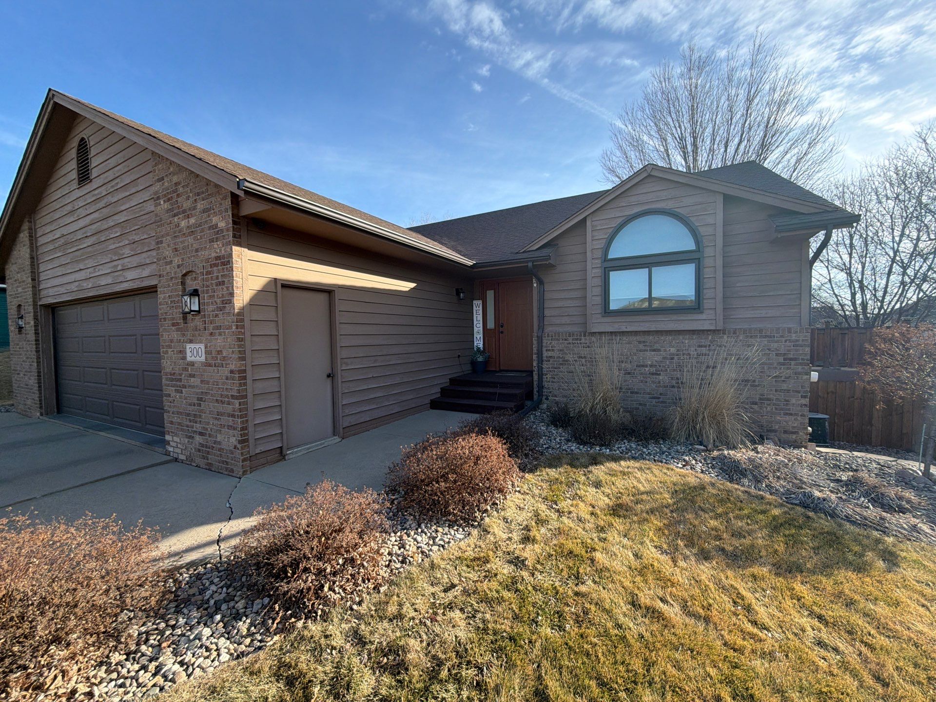 Wood Siding Restoration and Exterior Painting in Sioux Falls by Select Painting, Coatings & Garage Cabinets