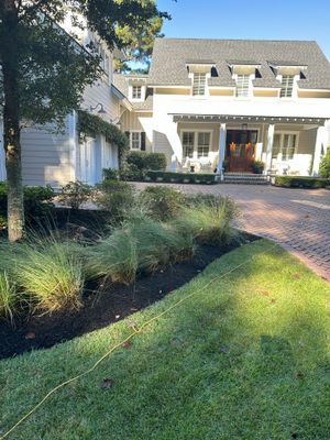 Herringbone Brick Paver Driveway and Custom Landscape Installation in Bluffton