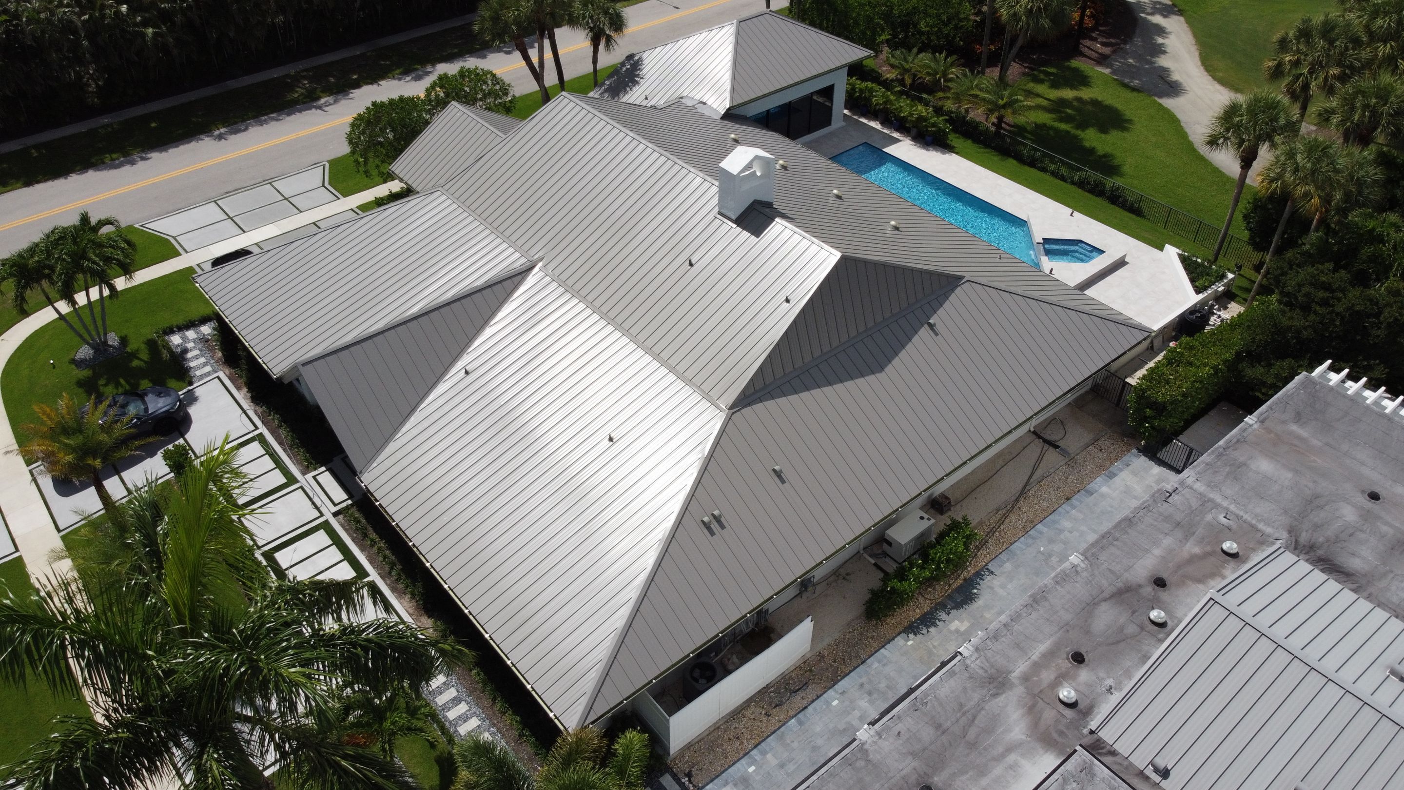 Residential Roofing Installation using 1" Nail strip metal roof by BLUES BROTHERS CONSTRUCTION CORP