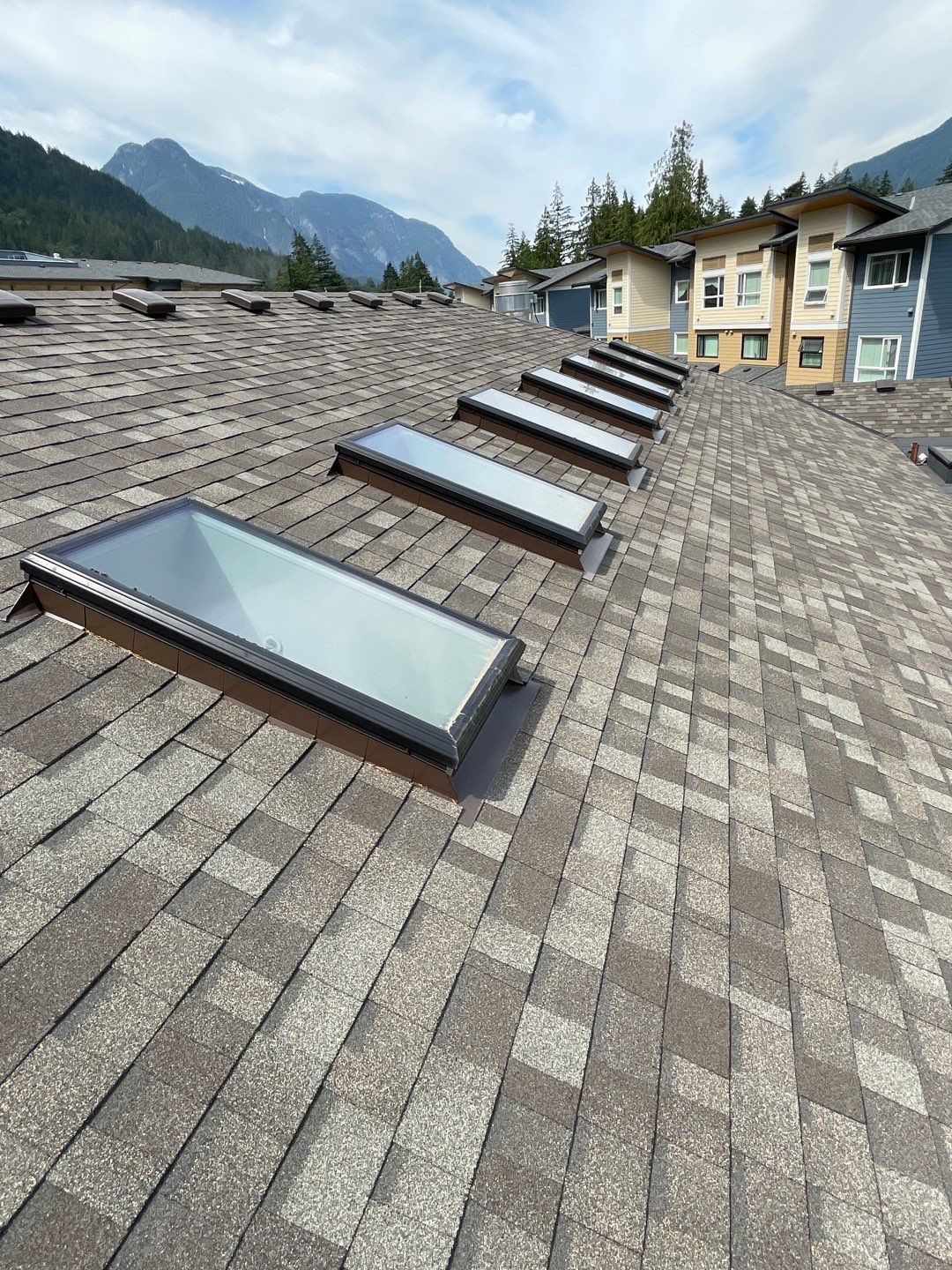 Residential ReRoofing Installation using OC Oakridge shingles by Top Notch Roofing Inc