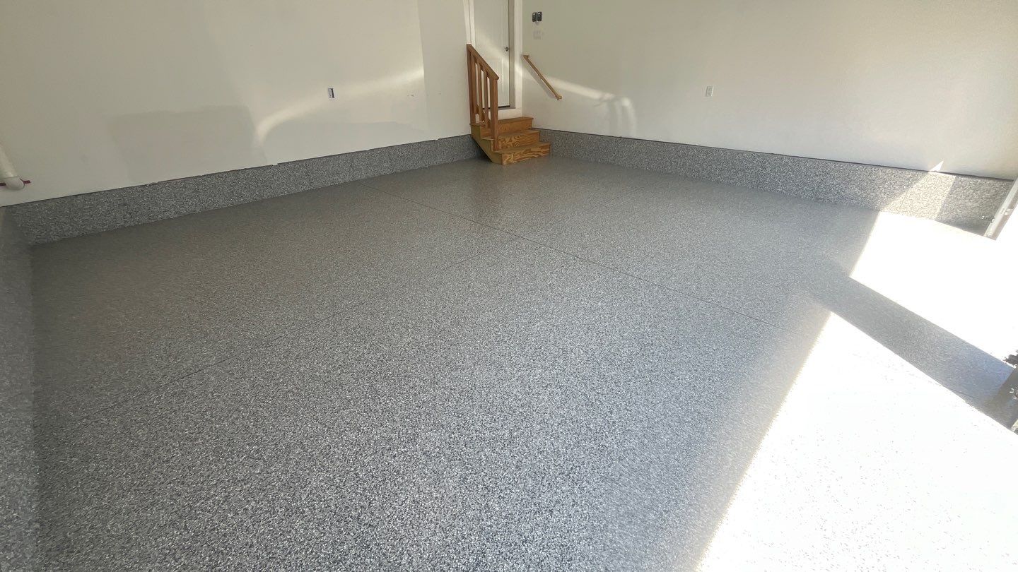Garage in Londonderry, NH 03053 by Symphony Concrete Coatings