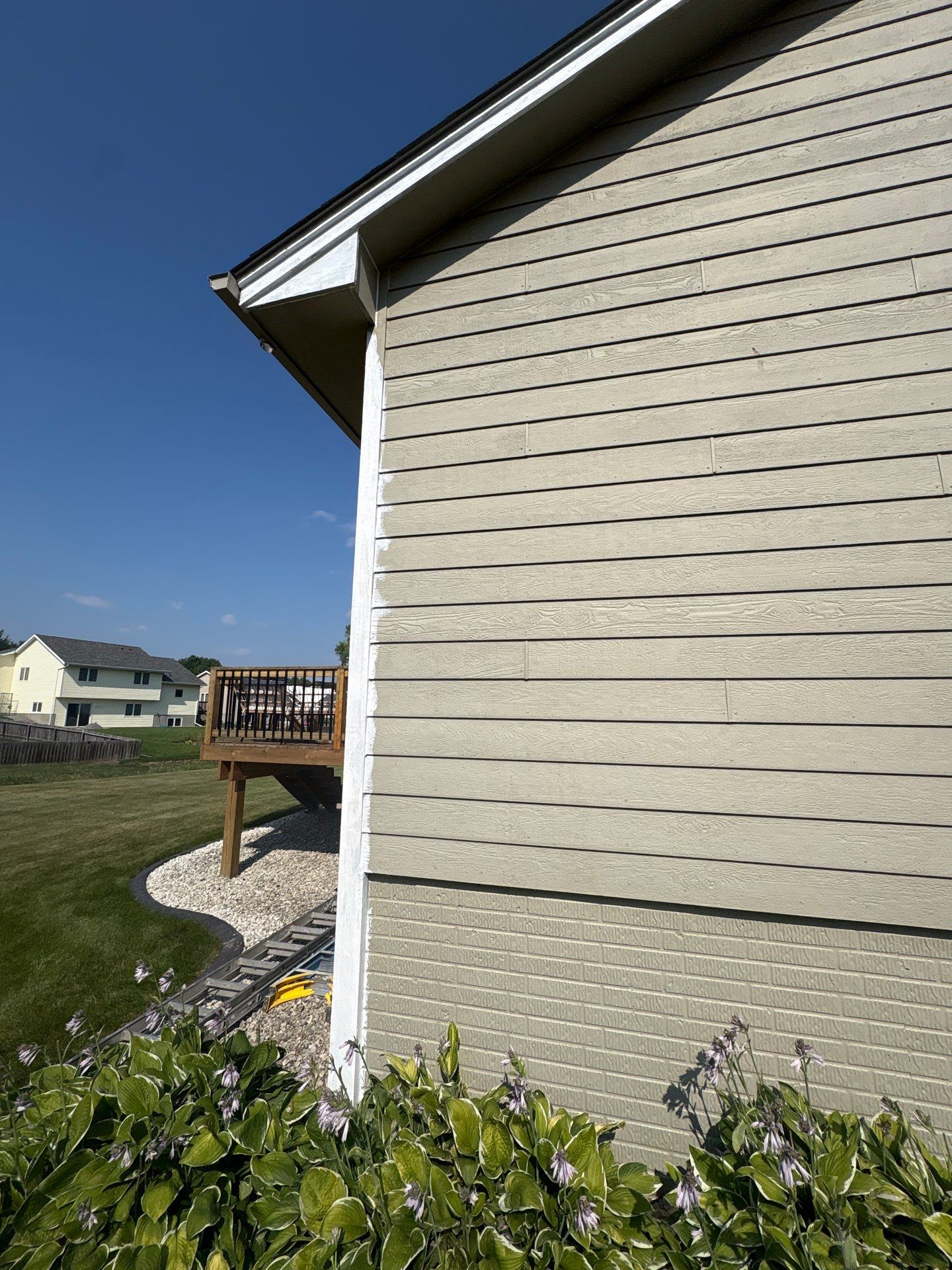 Residential Exterior Painting and Siding Refresh in Sioux Falls by Select Painting, Coatings & Garage Cabinets
