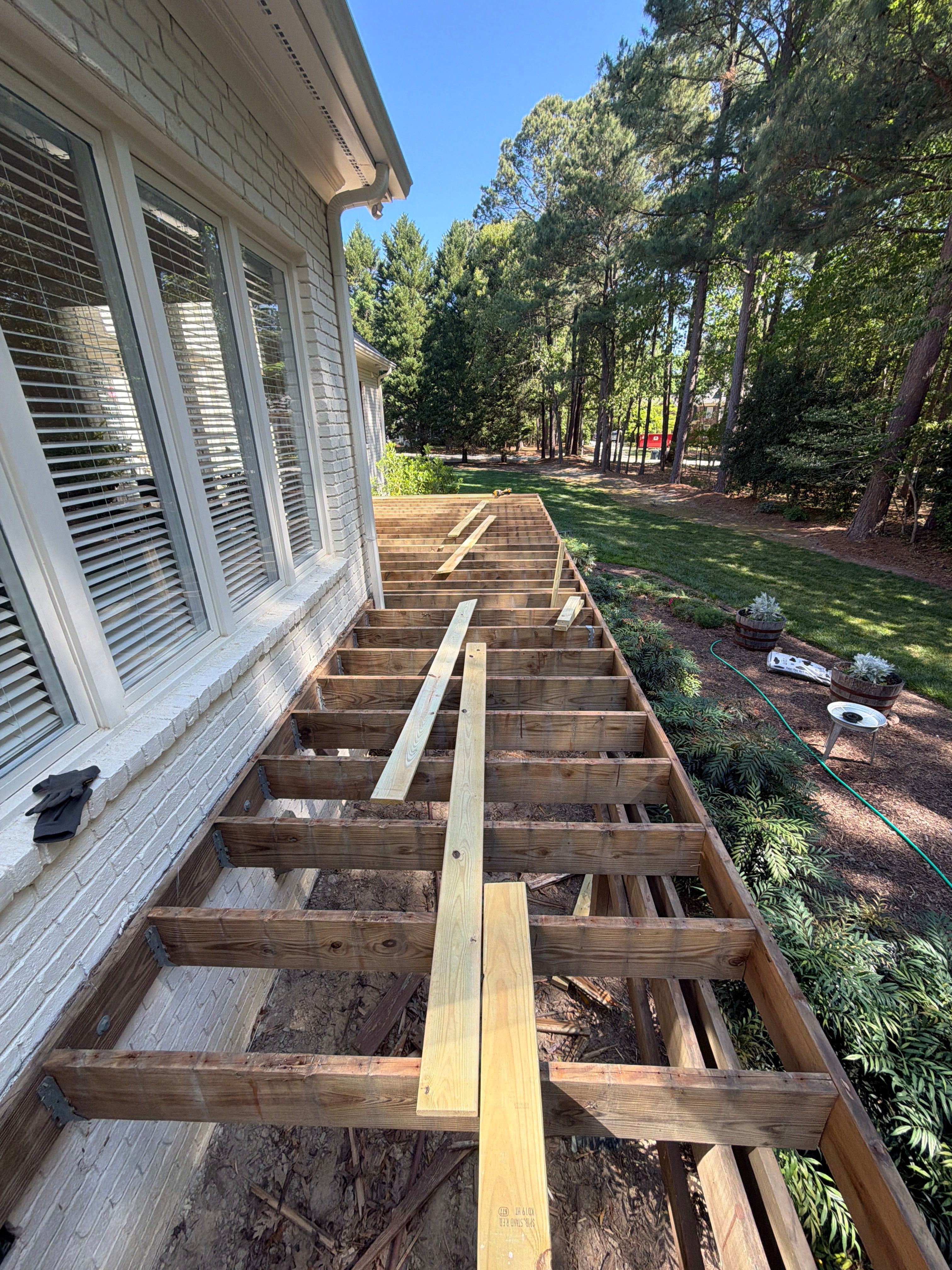 Deck Stain, Round Balusters & Screened Porch Transformation by Billy Weatherspoon Contractor