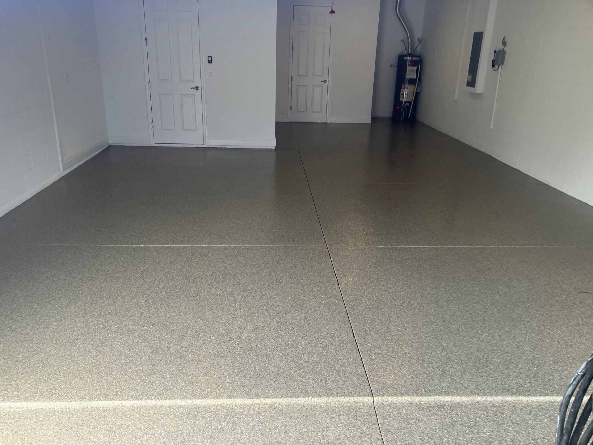 Garage Project in Trailmix by Cross Creek Concrete Coatings