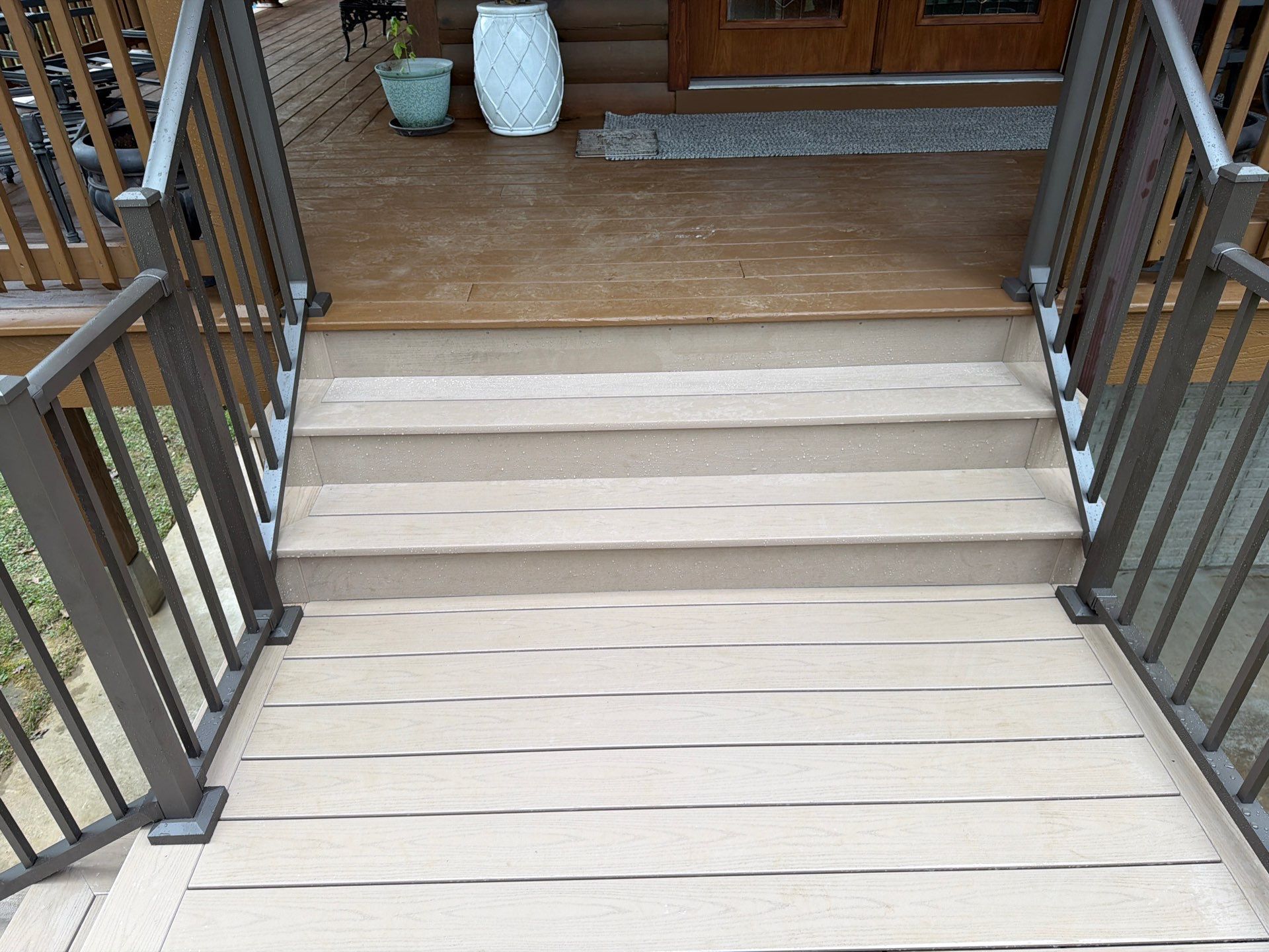 Log Cabin Wrap-Around Deck and External Staircase Installation in Caldwell by Walnut Hollow Decks & Outdoor Living