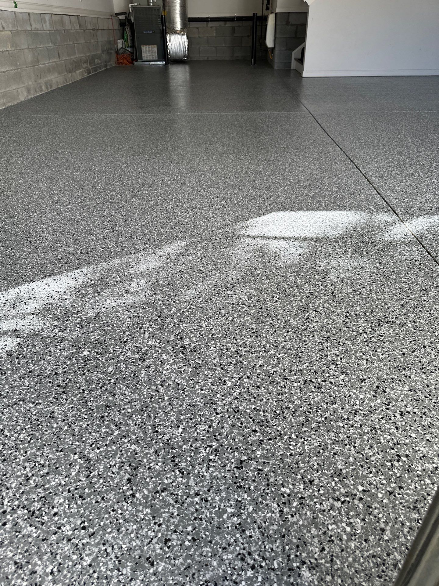 Garage Floor Coating using Wombat by My Garage Floor Guys