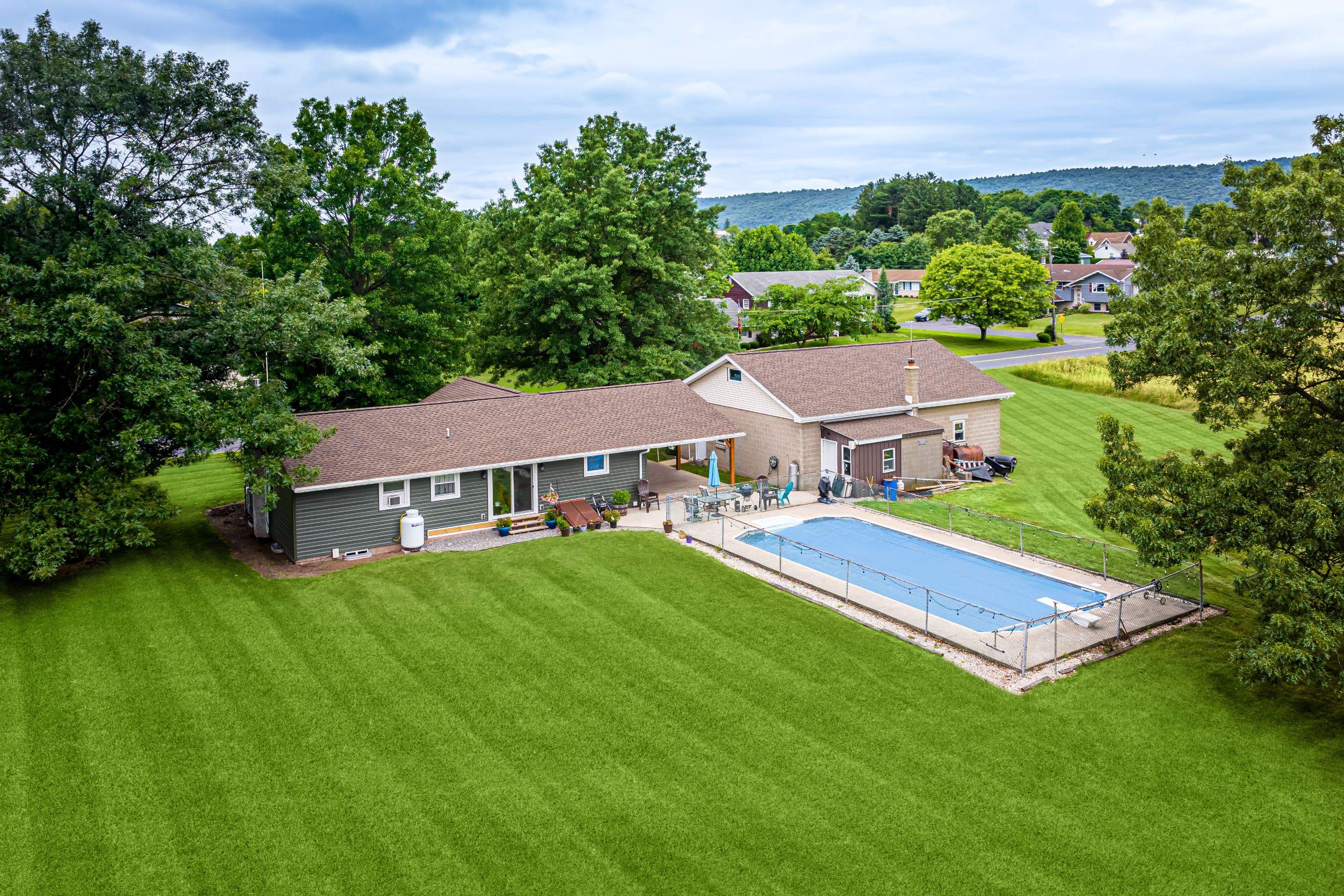 Shingle Roof- new siding- entry door by Esh Builders