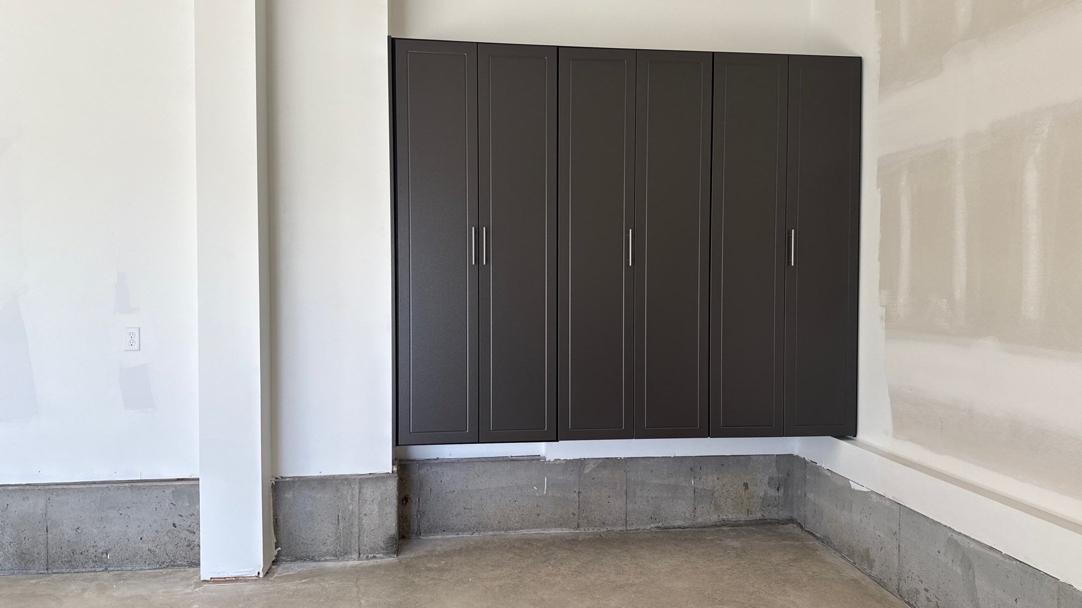 Nice Clean Look With These Pewter Cabinets by Banner Garage
