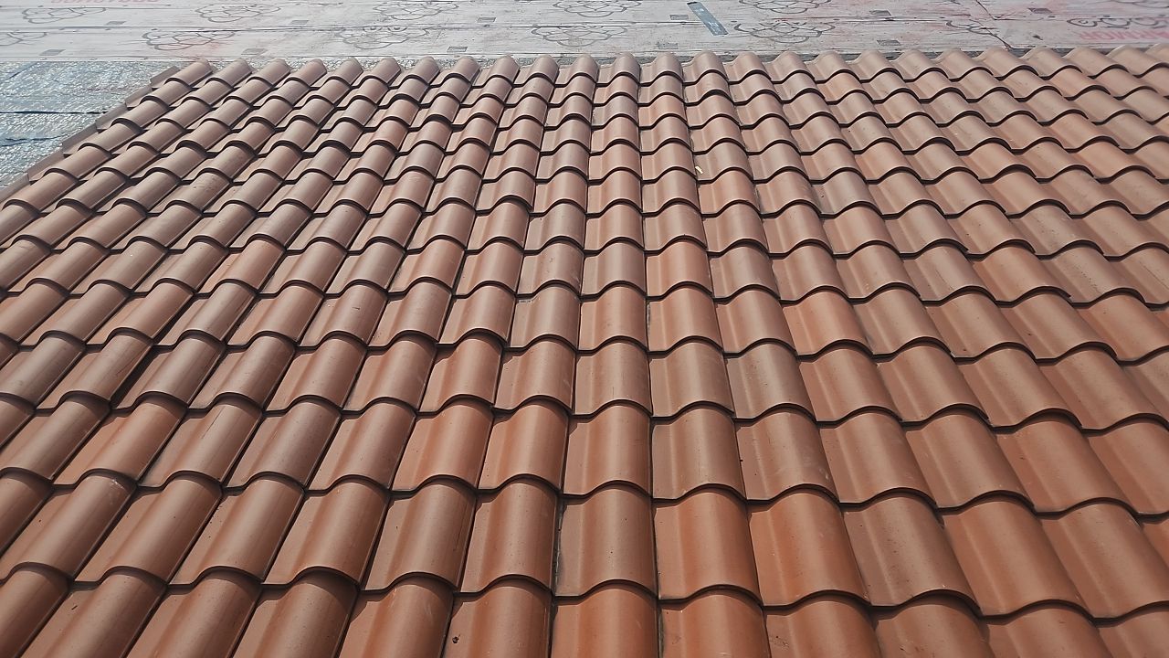 Commercial Roofing using  Ludowici Spanish 18 Clay Tile by Absolute Roofing and Construction