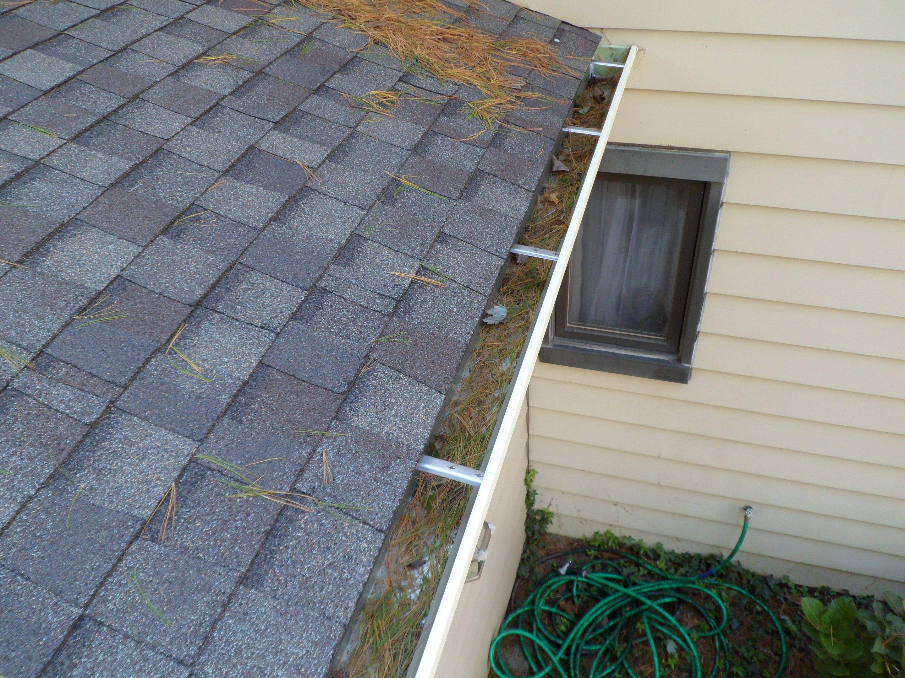 Residential Roofing Installation using Landmark Shingles Color Weatherwood by Alpha Design Services
