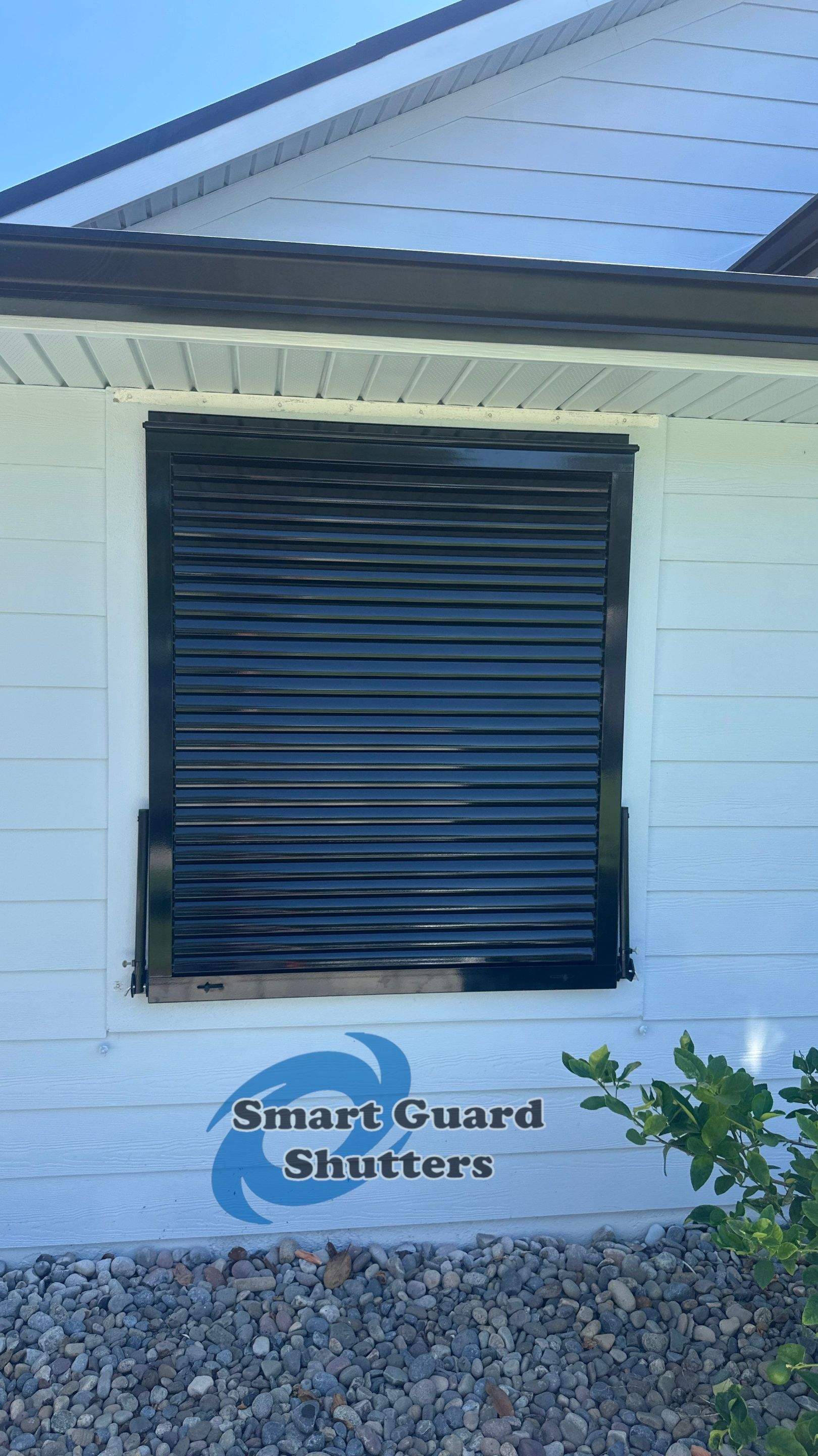 Impact Bahama Shutters in Jet Black by Smart Guard Shutters