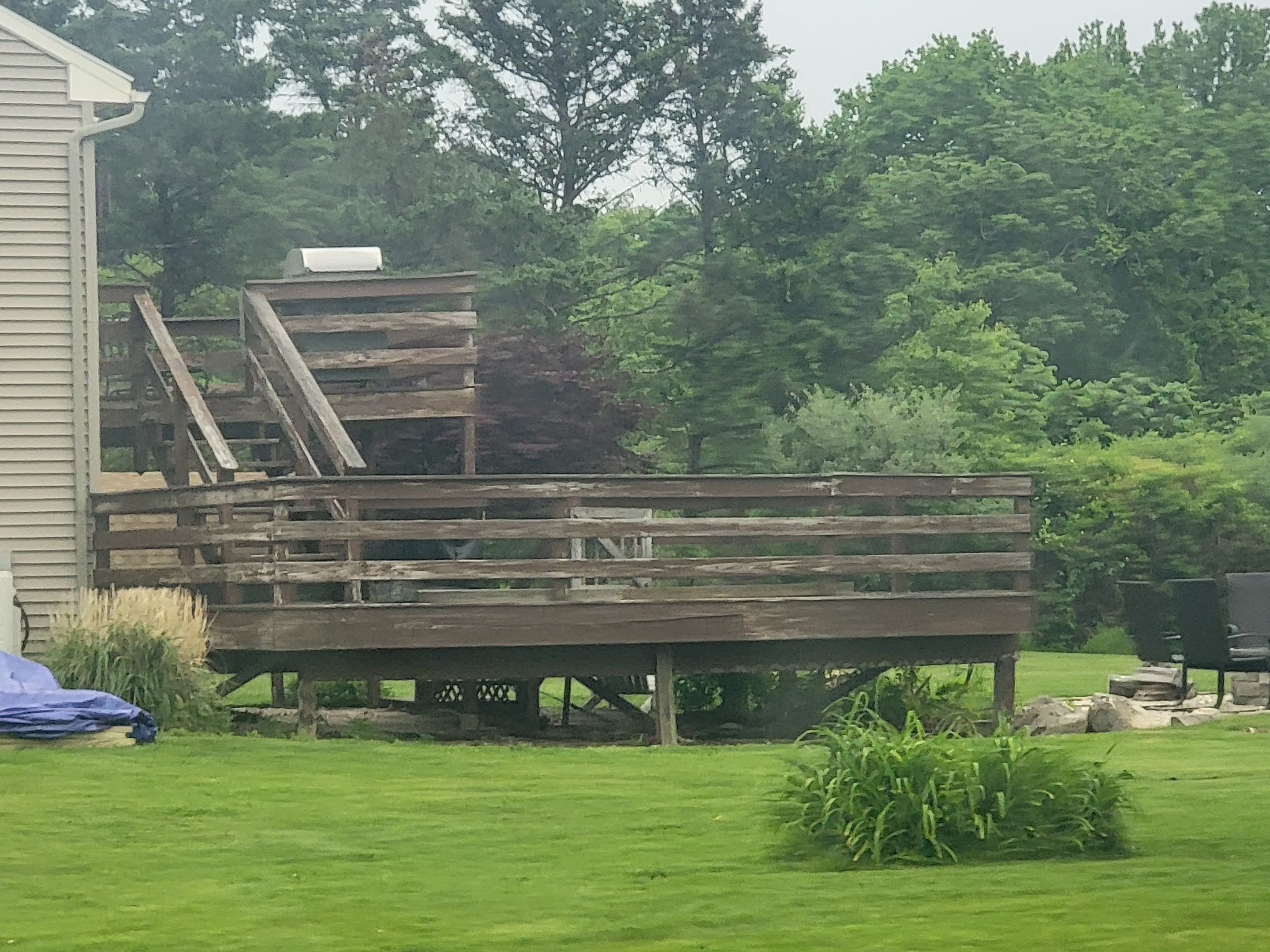 Deck Replacement using Trex Tropical Havana Gold and matching transcend cocktail railing.  by DiGiorgi Roofing and Siding Inc