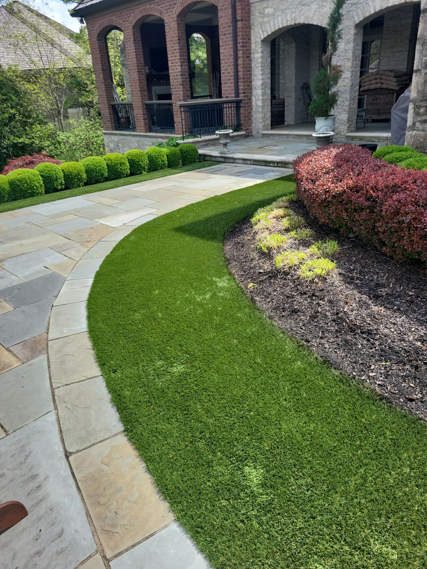 Muirfield Village backyard by Southwest Greens Midwest