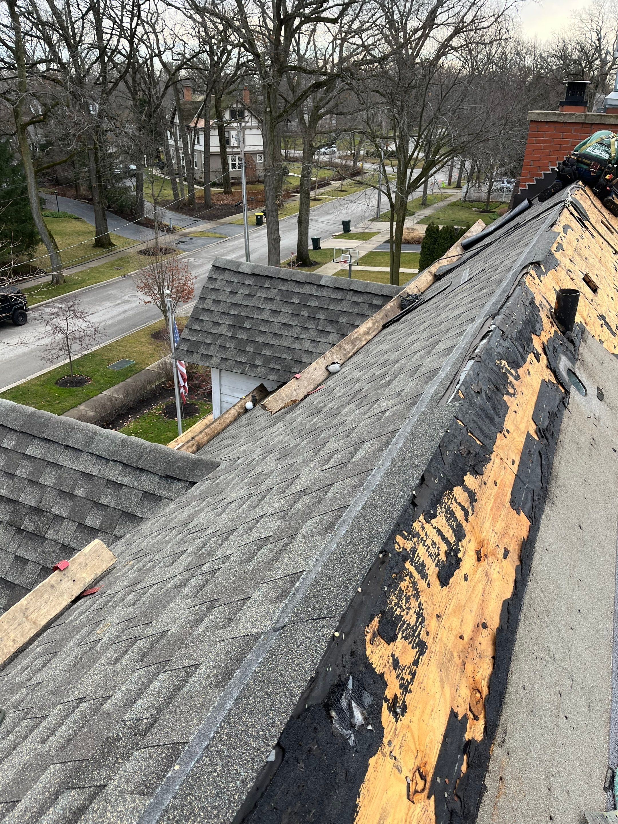 Asphalt Roof Replacement with Half Round Copper Gutter Installment by Custom Installations