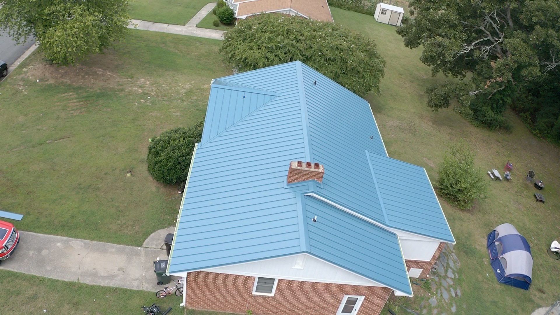 Carolina Blue Standing Seam Roof by Just In Time Roofing and Restoration