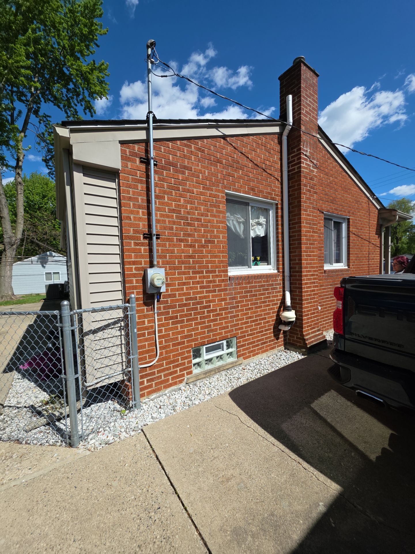 Exterior Brick Staining Transformation by Top Shelf Painter