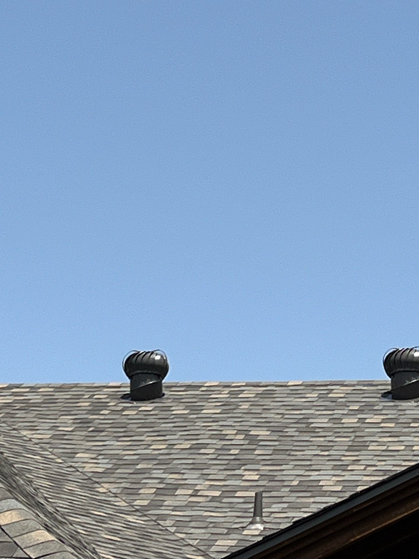 Red brick with IKO Cornerstone  by Tejas Roofworks + Restoration