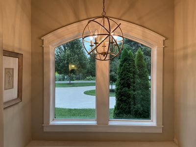 Stained Wood Plantation Shutter Upgrade for Arched Windows in St Joseph