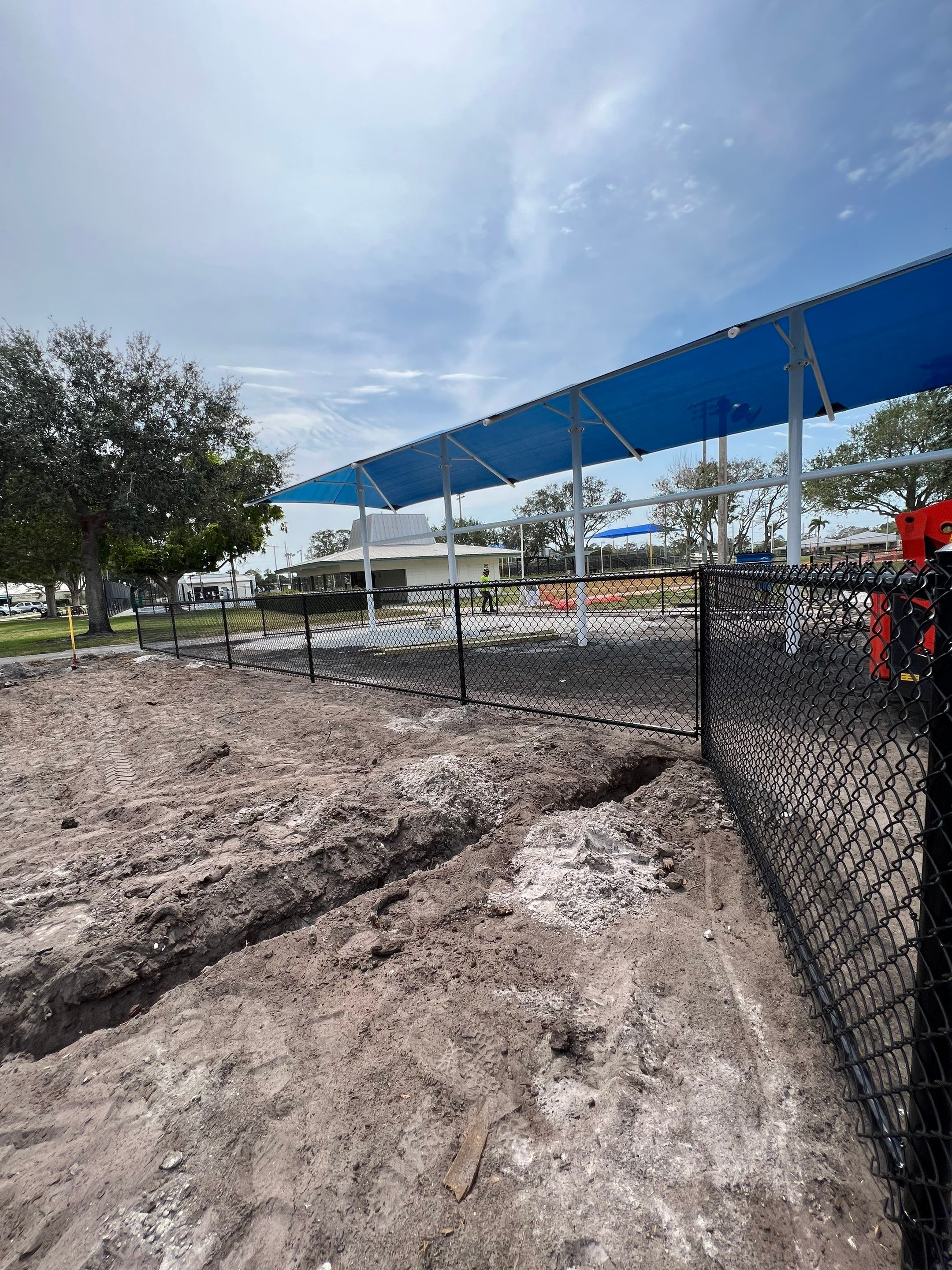 Vinyl Coated Chain-link fence for the City of Naples around Fleischmann Park Playground.  by Asap fence and gates, LLC