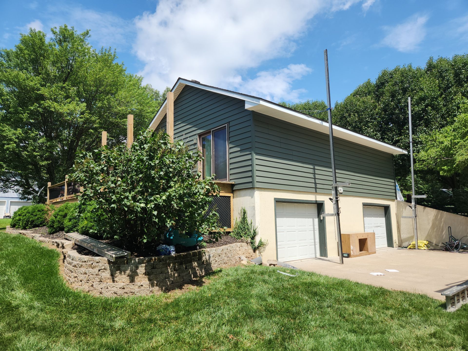 New Craneboard Siding on this Platte City, Mo home  by EEC  Windows, Siding & Roofing 
