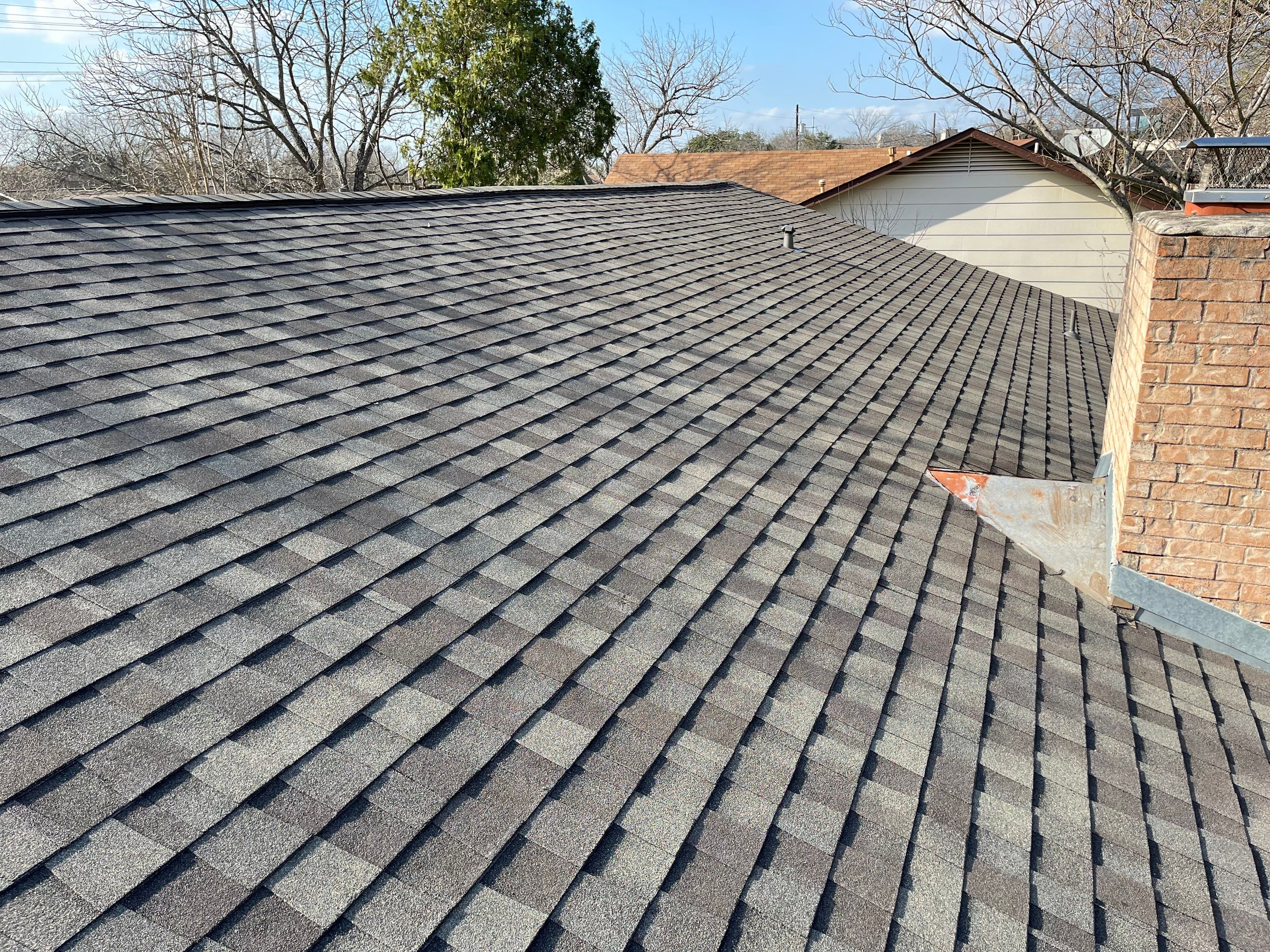 Estate Gray Shingles by Reimagine Roofing